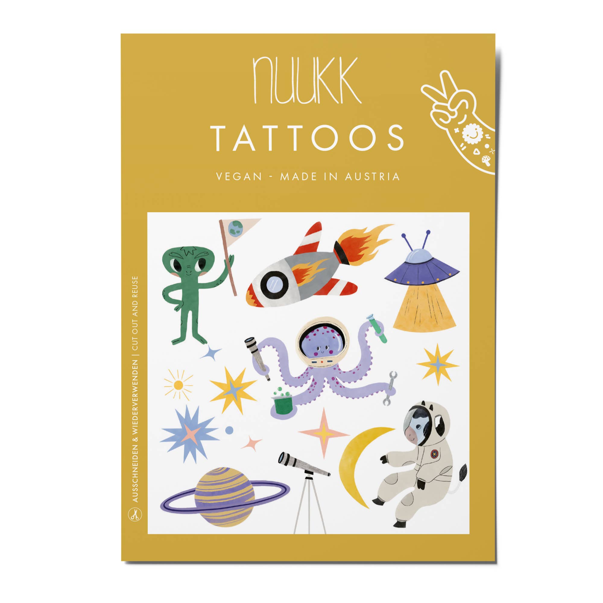 NUUK tattoos packaging with space-themed illustrations on a yellow background