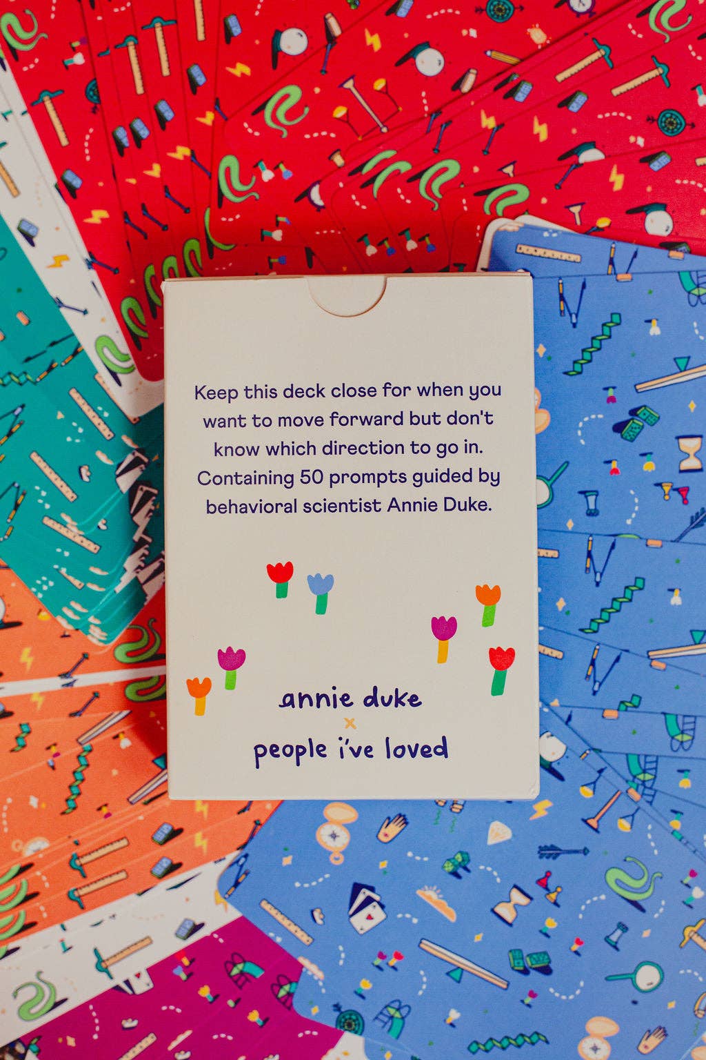 Card with text and colorful patterns on a multicolored background