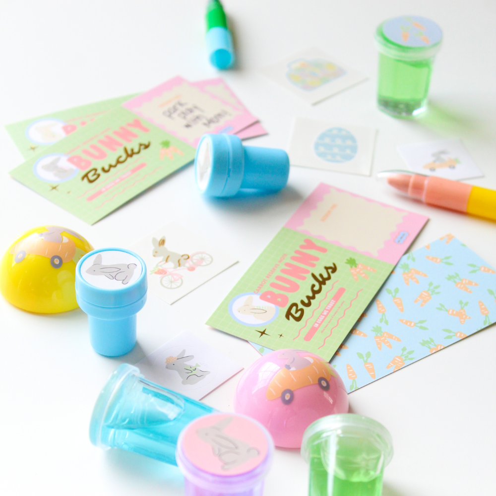 Colorful stampers and cards on a white surface