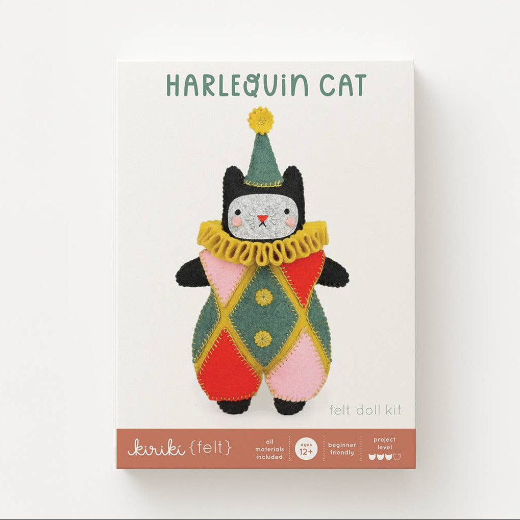 Felt doll kit packaging for a harlequin cat on a white background