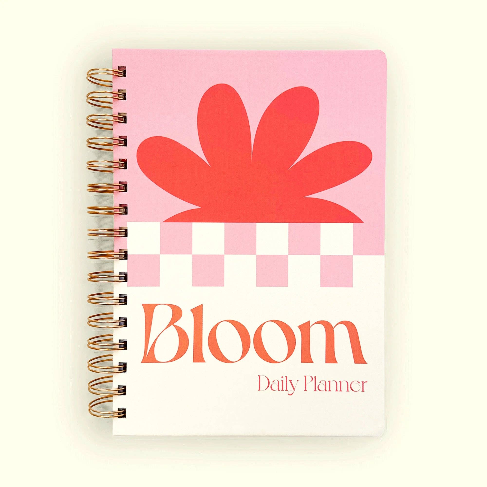 Daily planner with a red flower design on a pink background