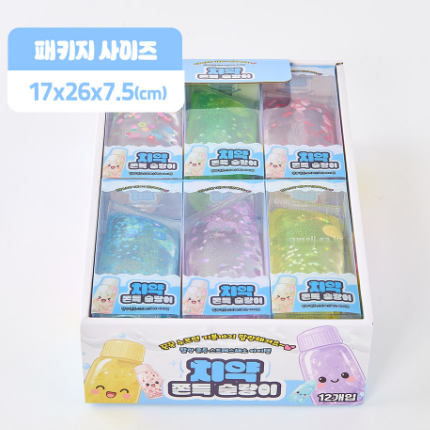 A boxed set of 12 small translucent squishy toys in assorted pastel and bright colors, displayed in a clear plastic window box with Korean text labels. A blue text bubble at the top left reads '패키지 사이즈 17x26x7.