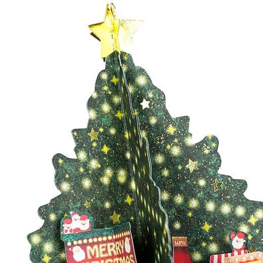 Decorative Christmas tree with lights and small ornaments on a white background