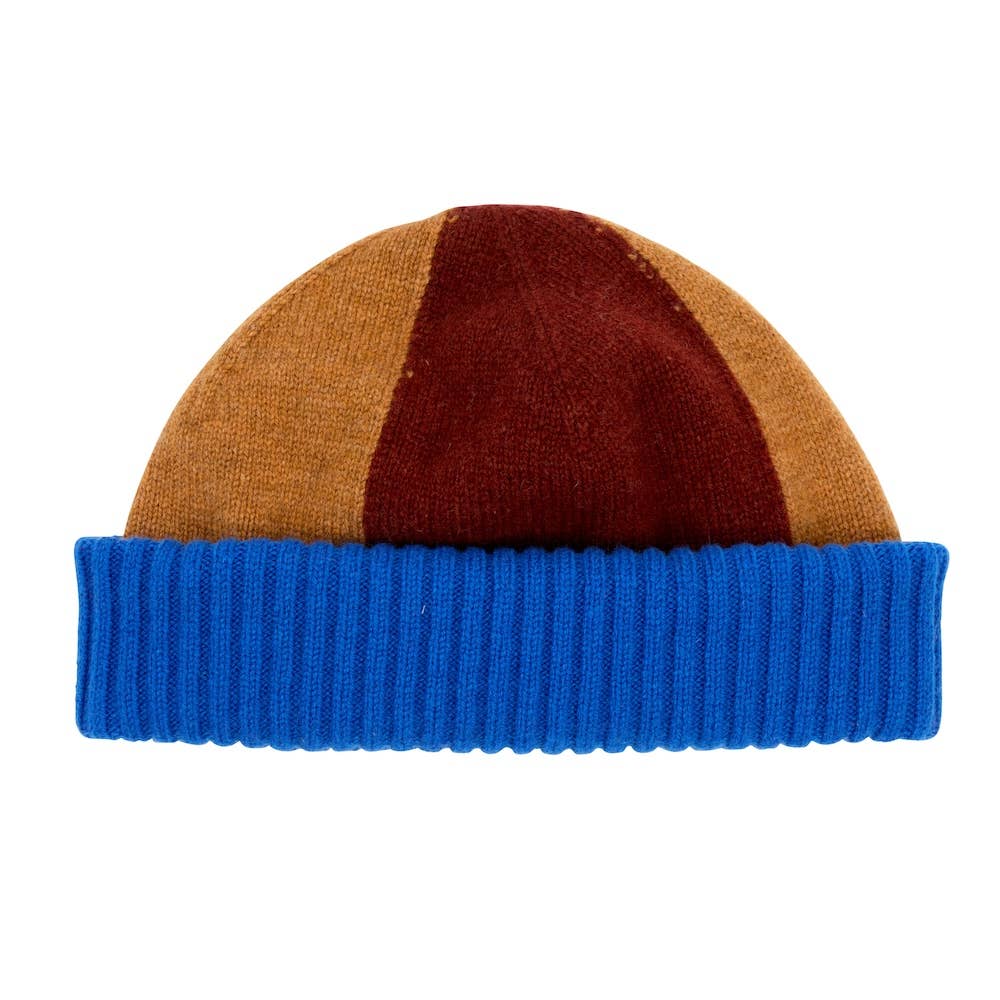 Color-blocked beanie with brown, blue, and red sections on a white background