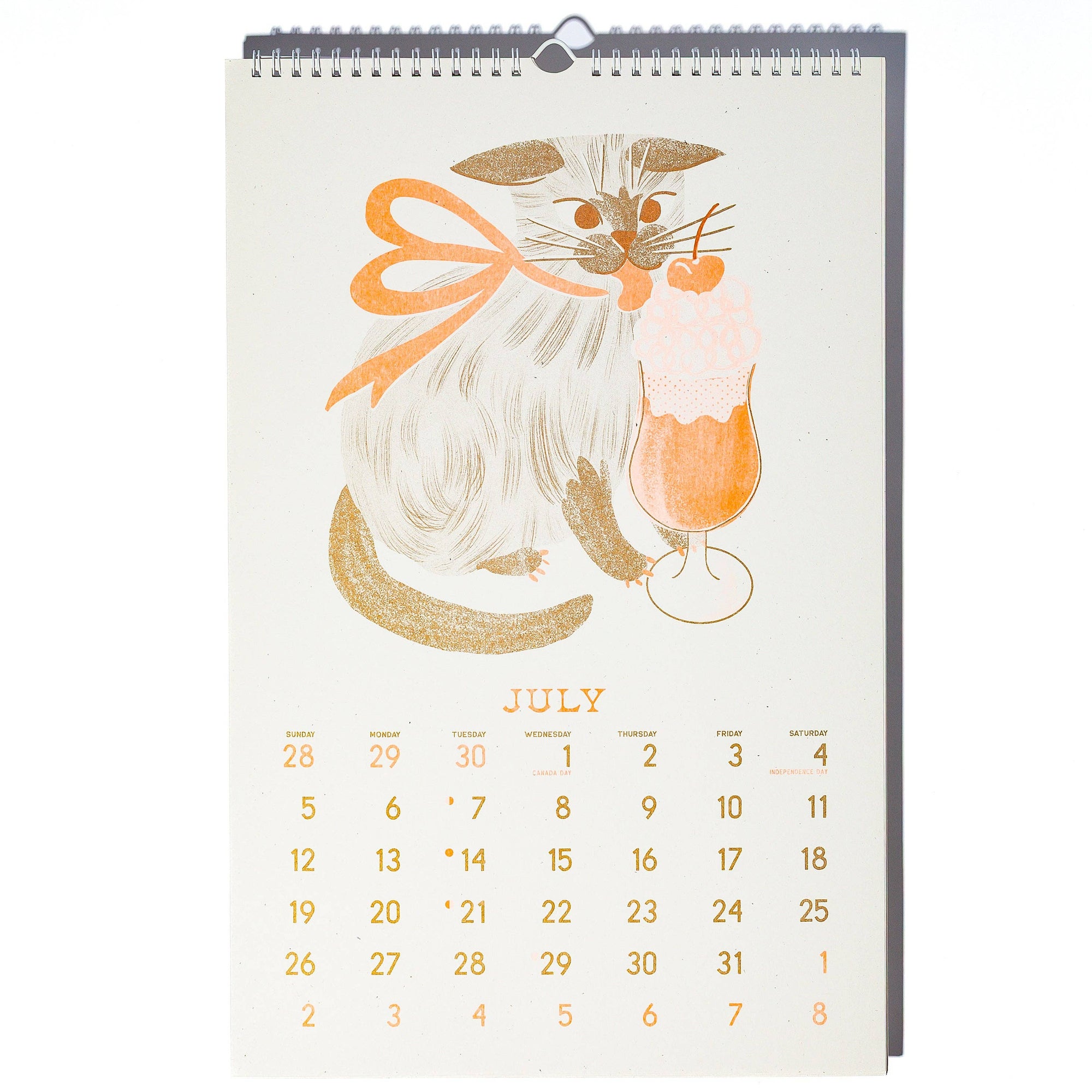 Calendar with a cat design and July on a white background