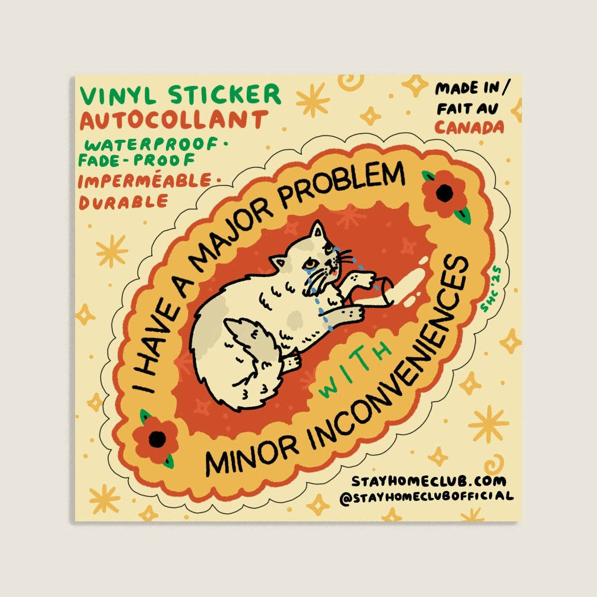 Vinyl sticker with a cat design and text on a beige background