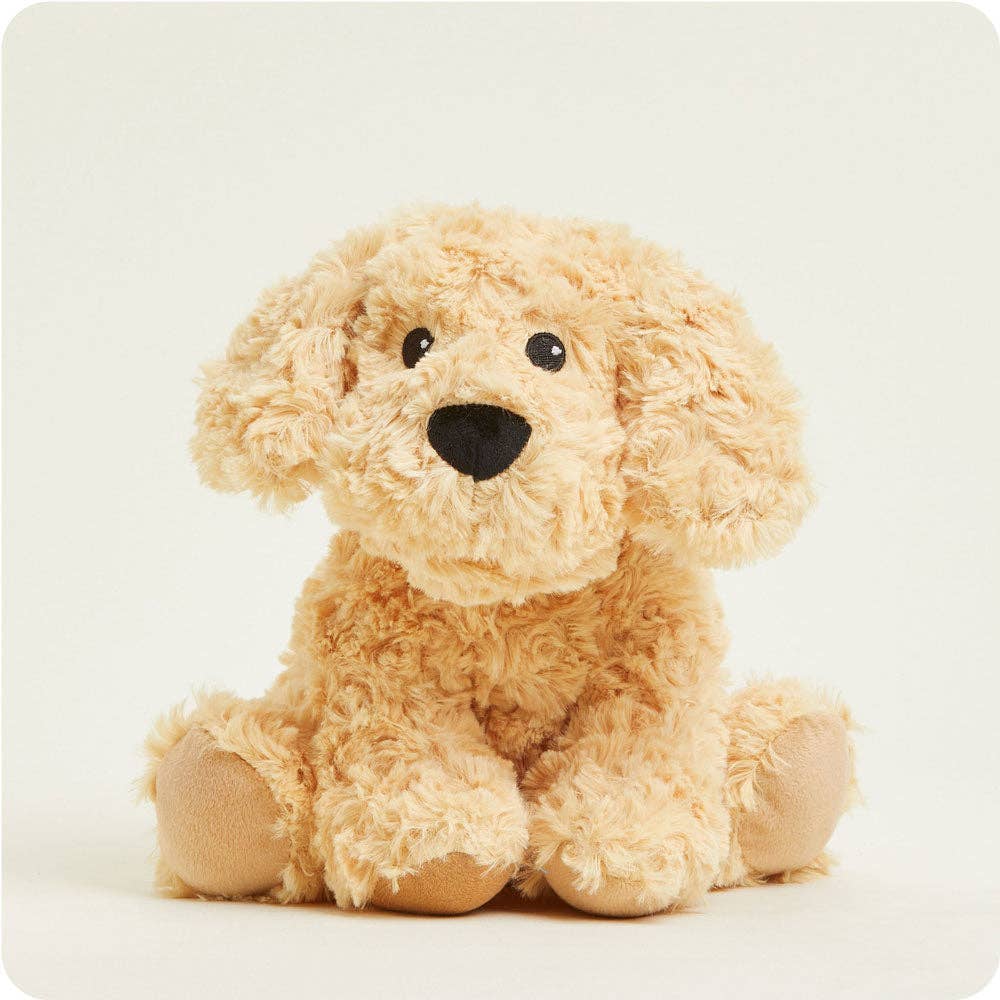 Plush dog toy on a light beige background