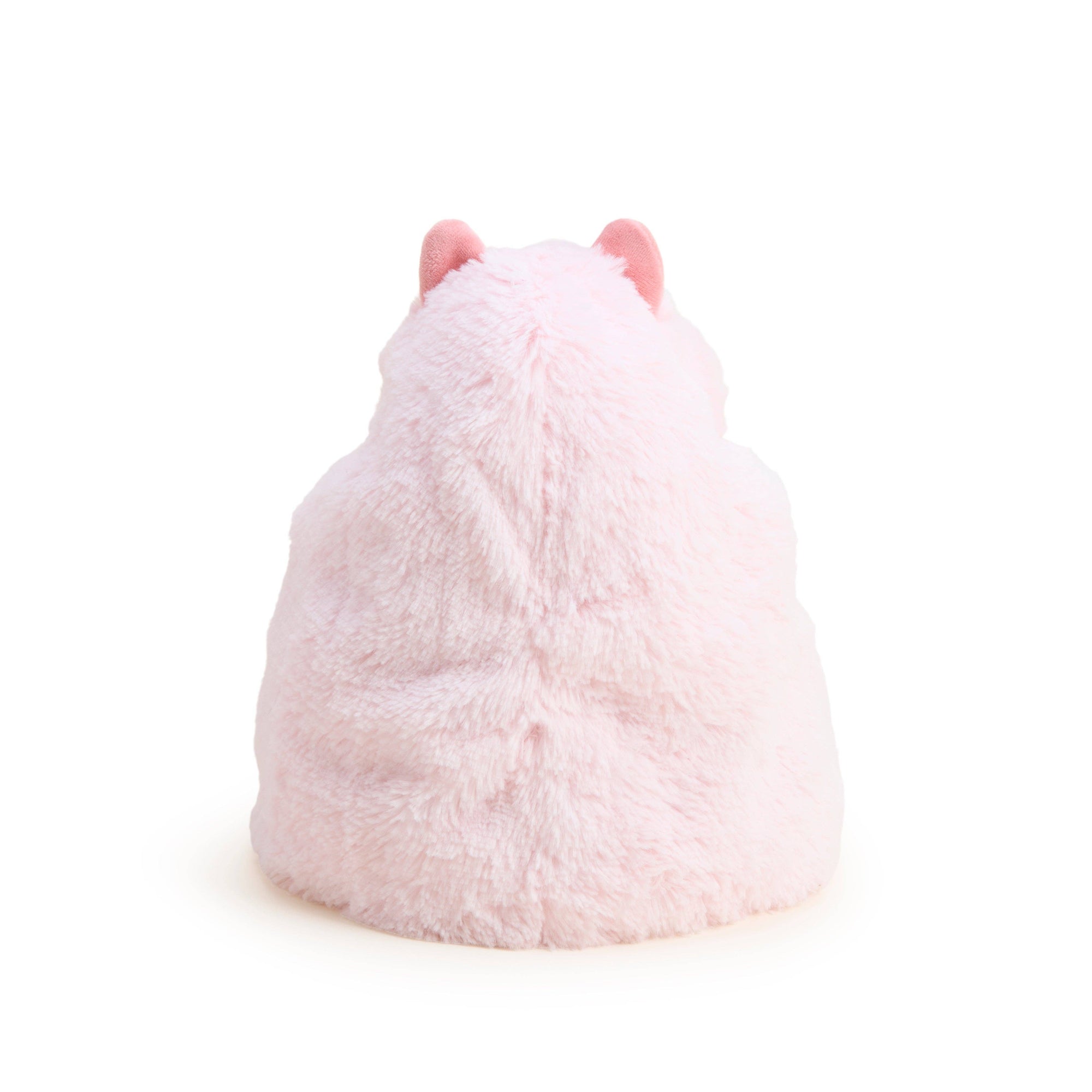 Pink plush toy with ears on a white background
