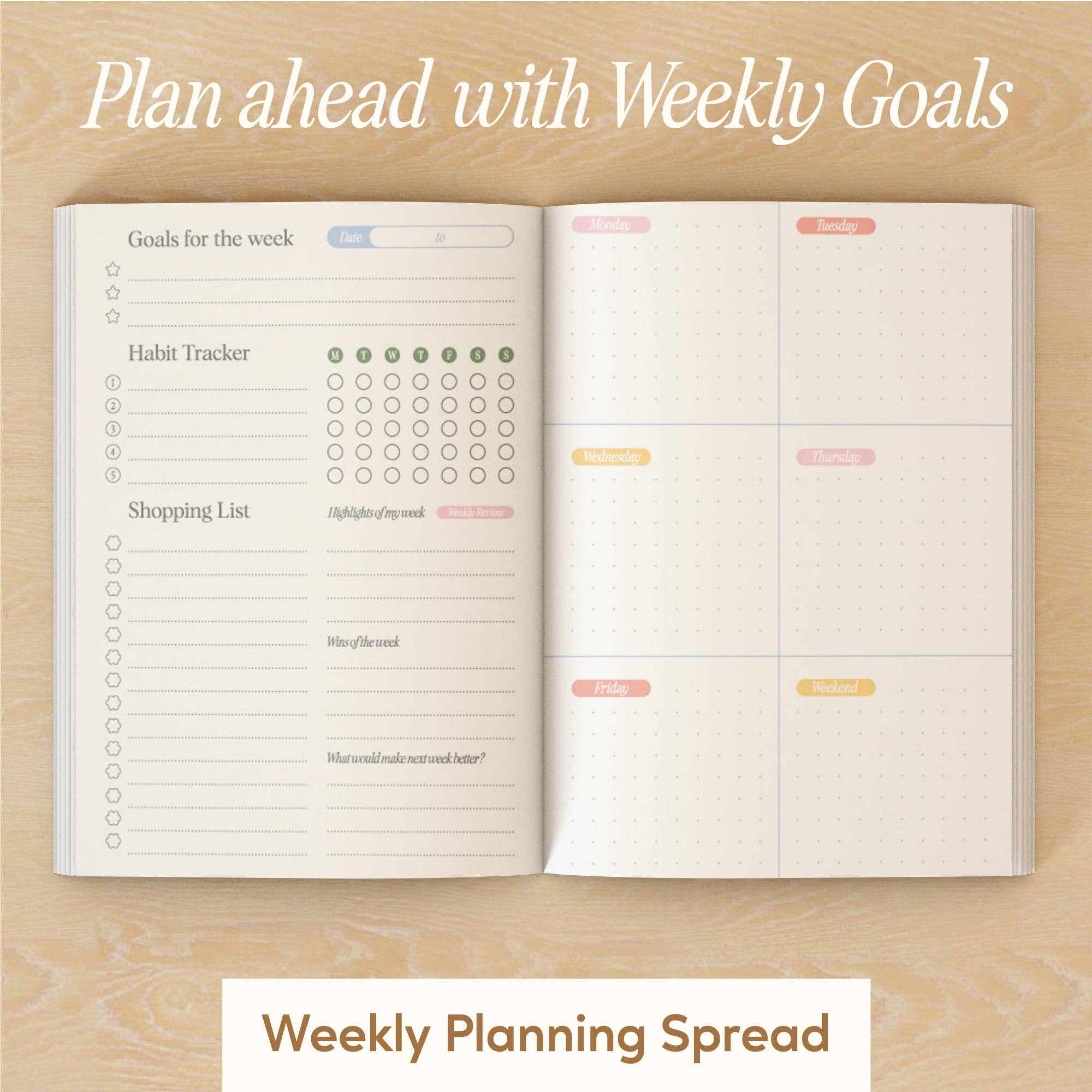 Open planner with weekly planning spread on a wooden surface