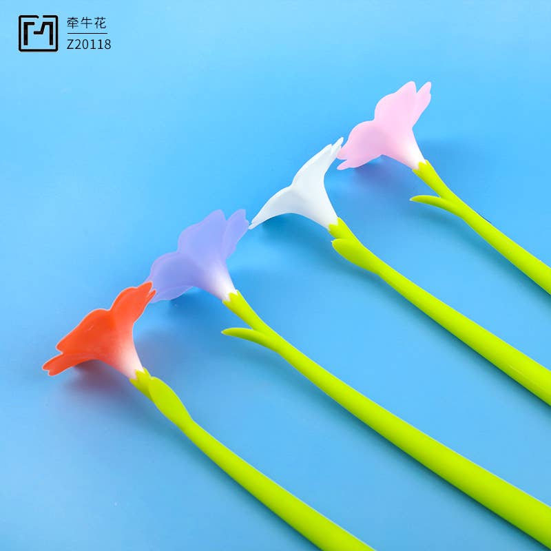Colorful flower-shaped straws on a blue background