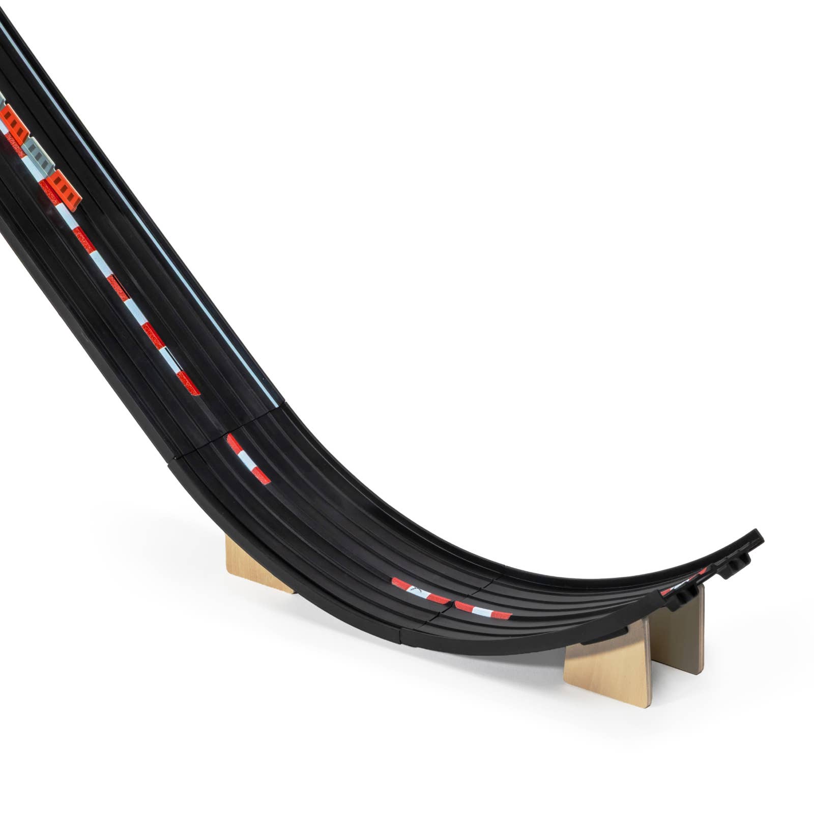 Black plastic track with red and white accents on a white background