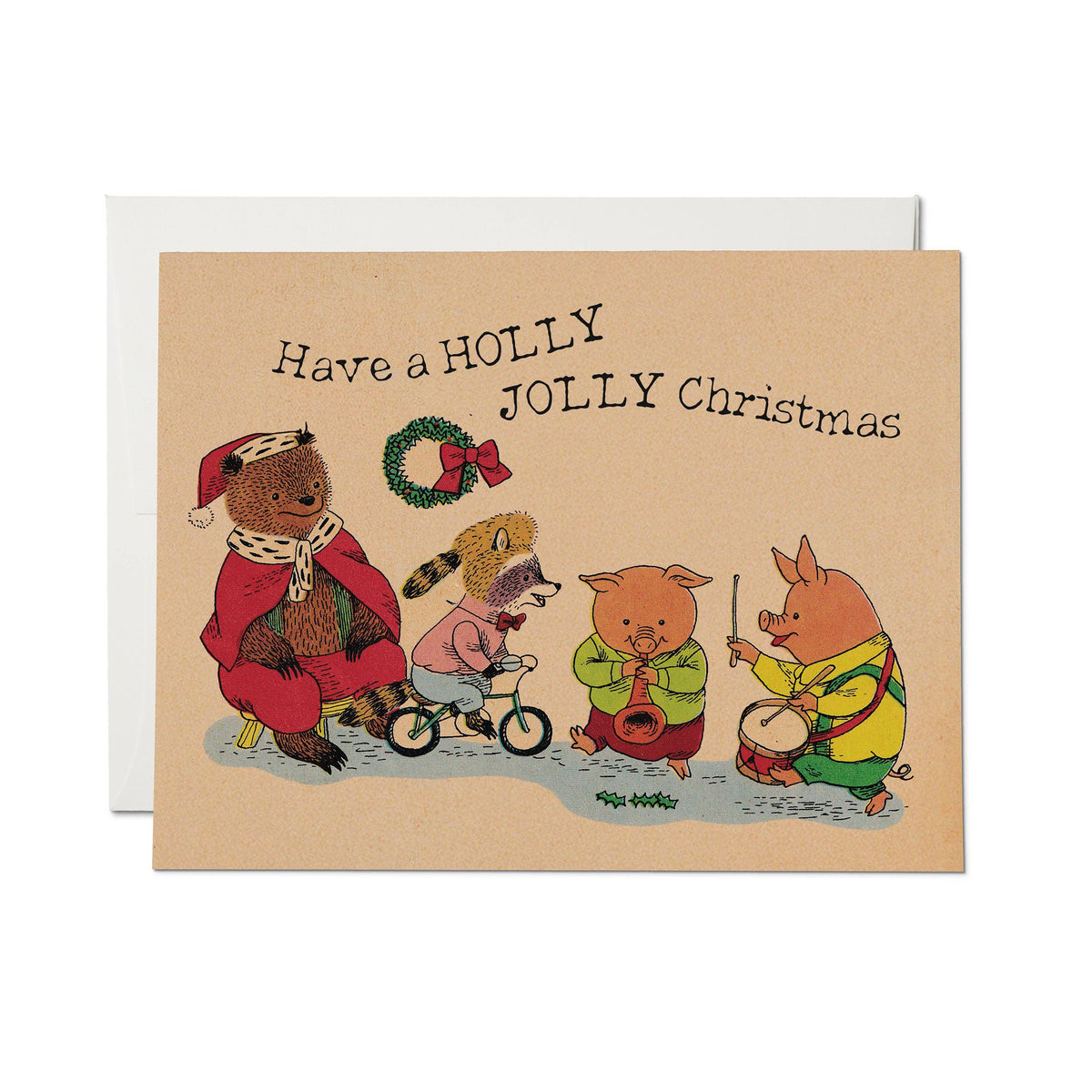 A Christmas greeting card featuring four cartoon animals playing music on a beige background, with the text 'Have a HOLLY JOLLY Christmas' above them. A white envelope is visible behind the card.