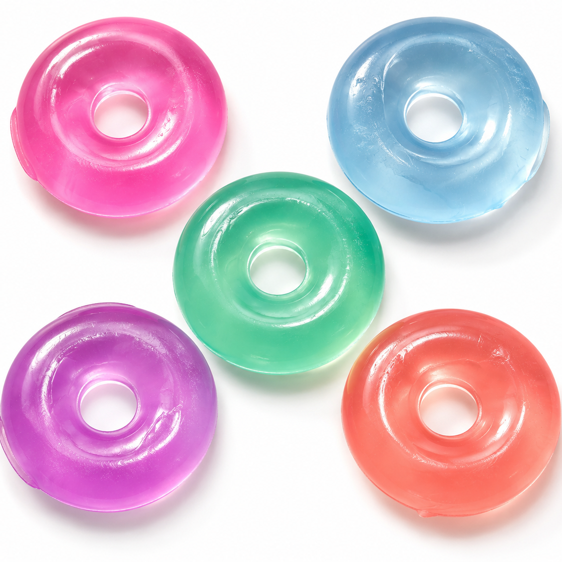 Five colorful donut-shaped objects on a white background