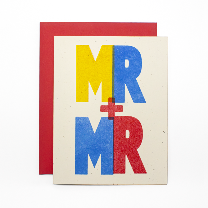 A square greeting card with a cream textured background featuring the text 'MR + MR' in large yellow, blue, and red letters, shown with a red envelope behind it on a white background.