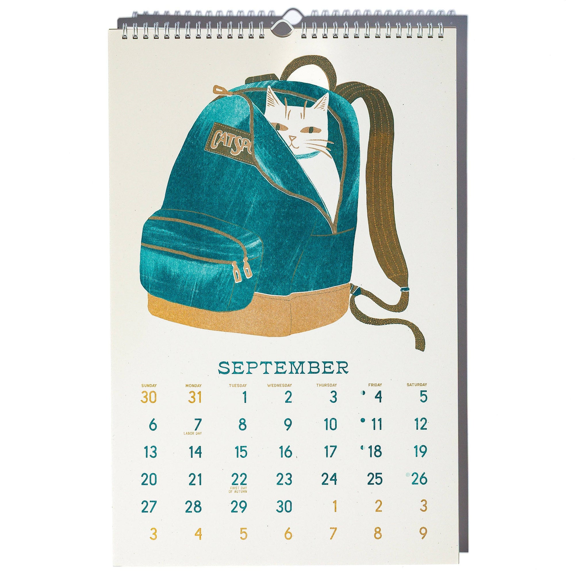 Calendar with a teal backpack and cat illustration on a white background