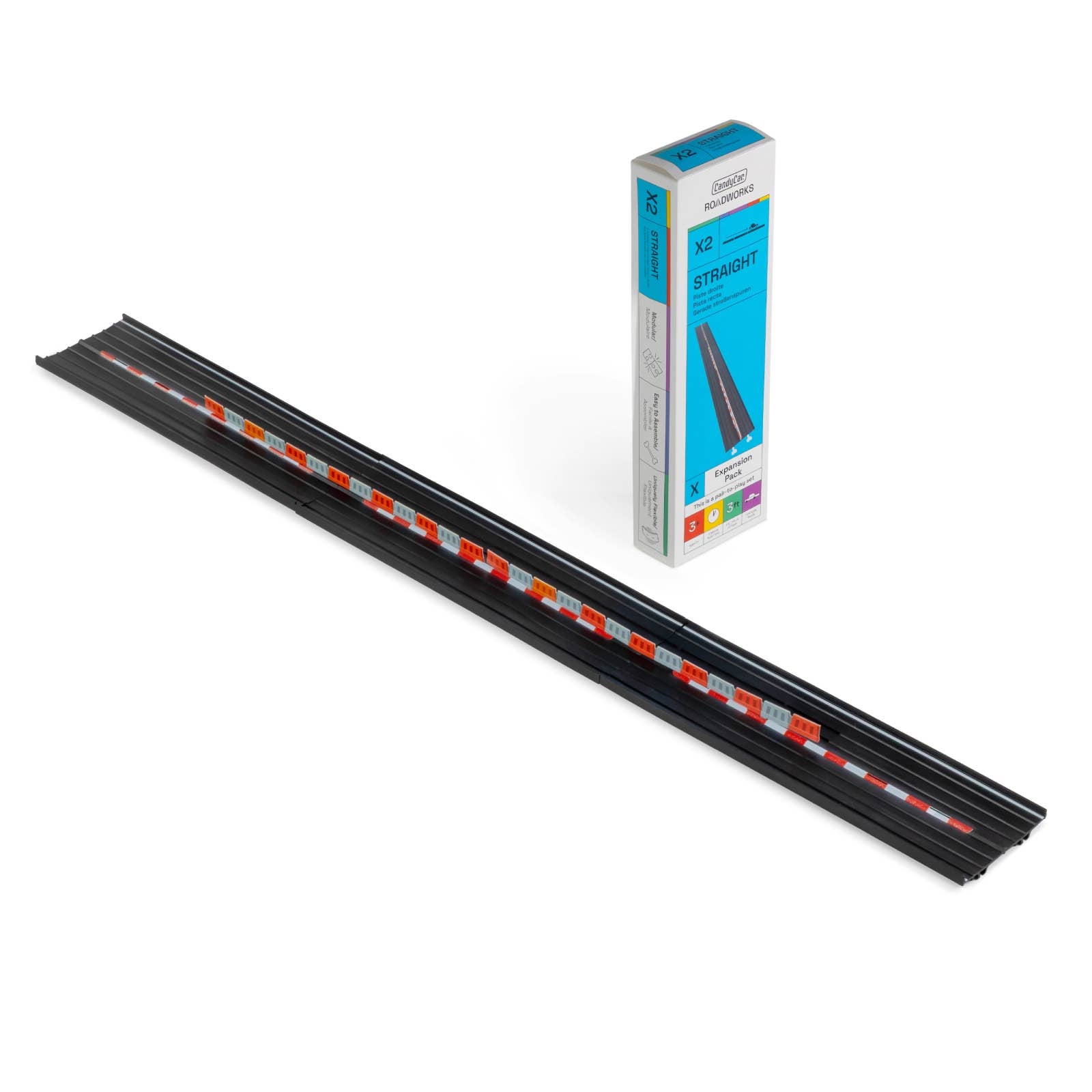 Black metal track with red and white accents next to a blue and white packaging box on a white background