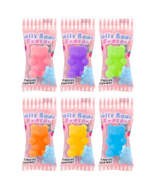 Six packages of jelly bear erasers with colorful bears on a white background