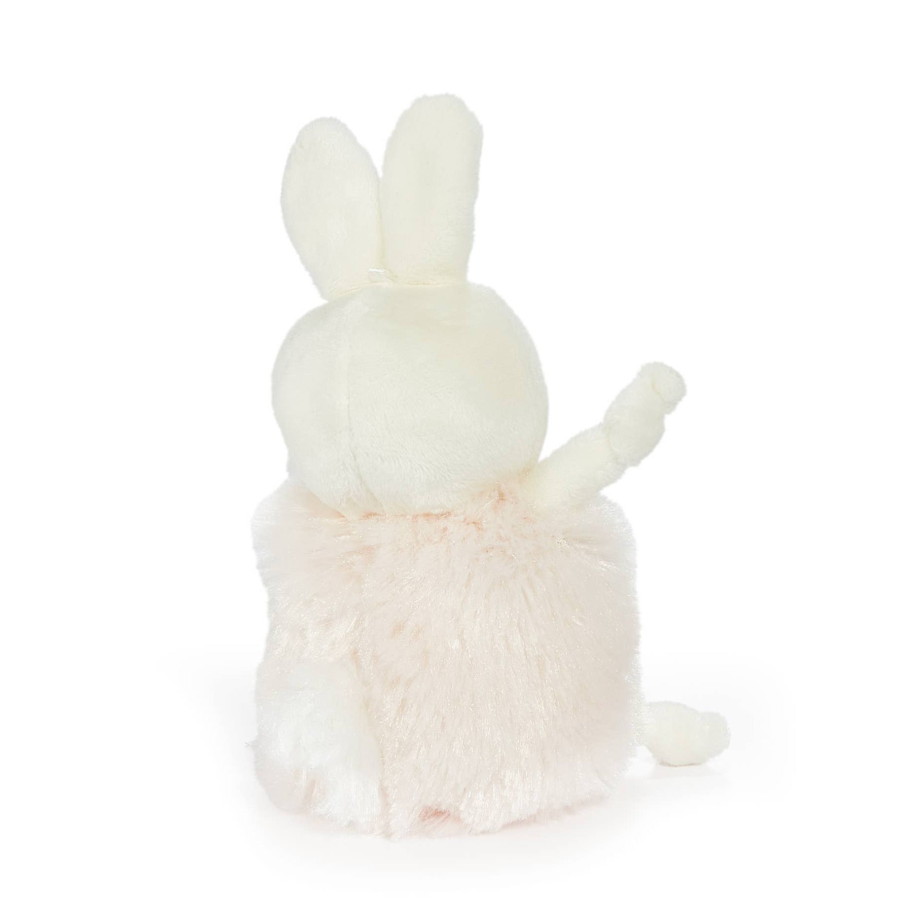 White plush bunny toy on a white background