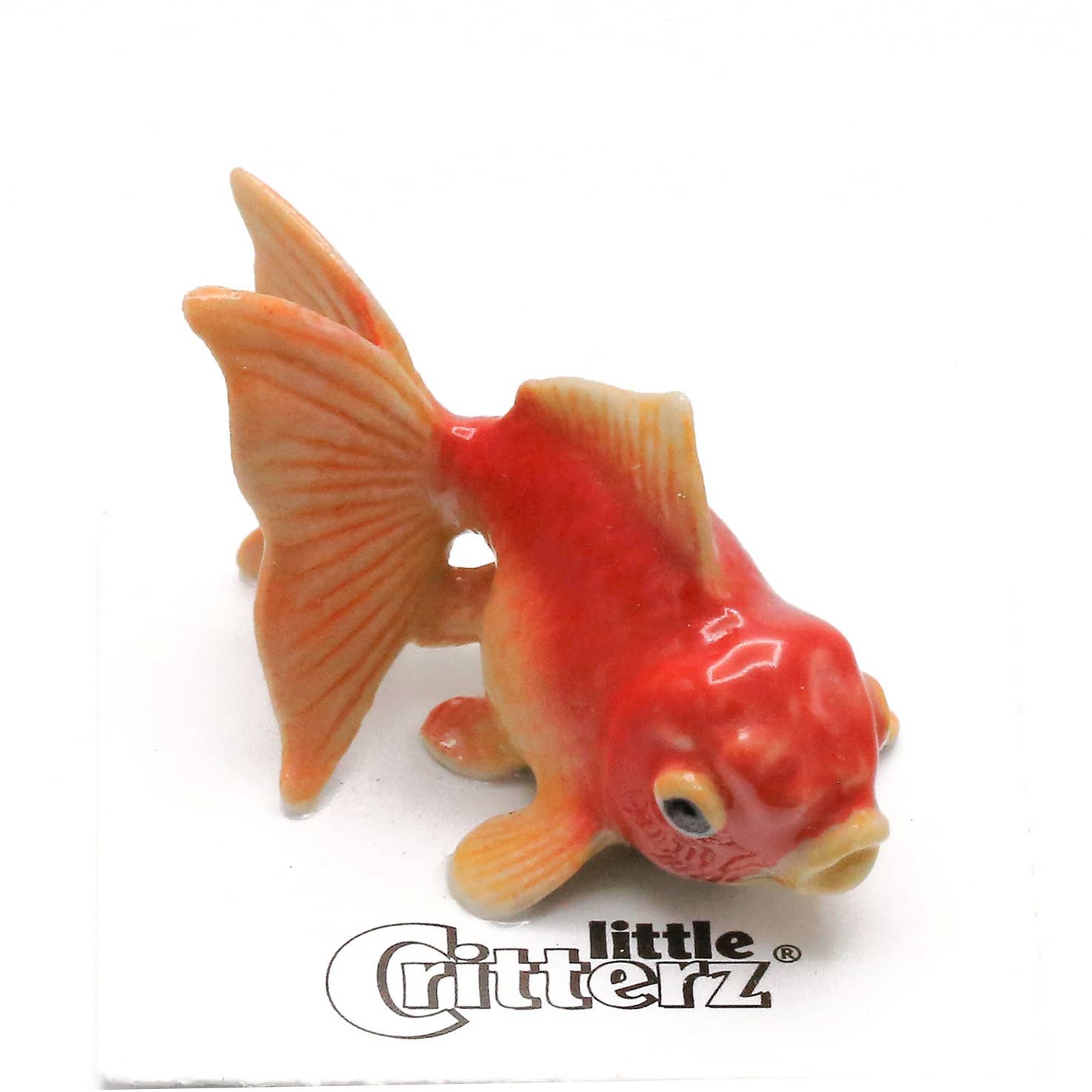 Red and orange fish figurine with 'little Critterz' branding on a white background