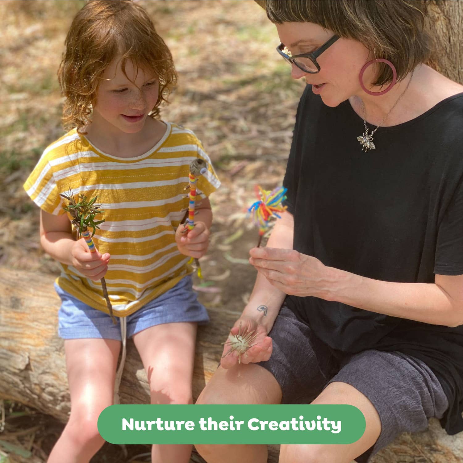 Woman and child sitting outdoors with small plants, text 'Nurture their Creativity'.