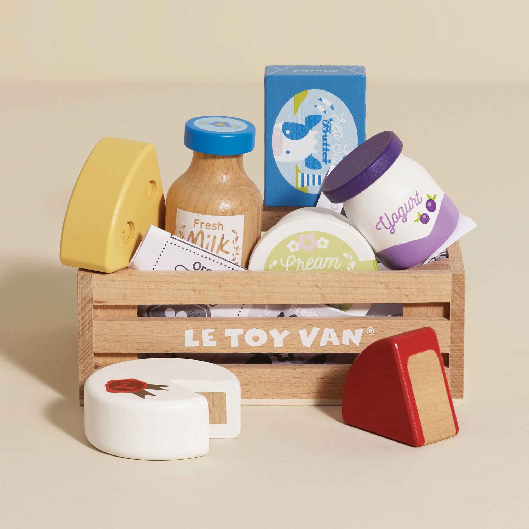 LE TOY VAN toy food set with wooden crate on a beige background