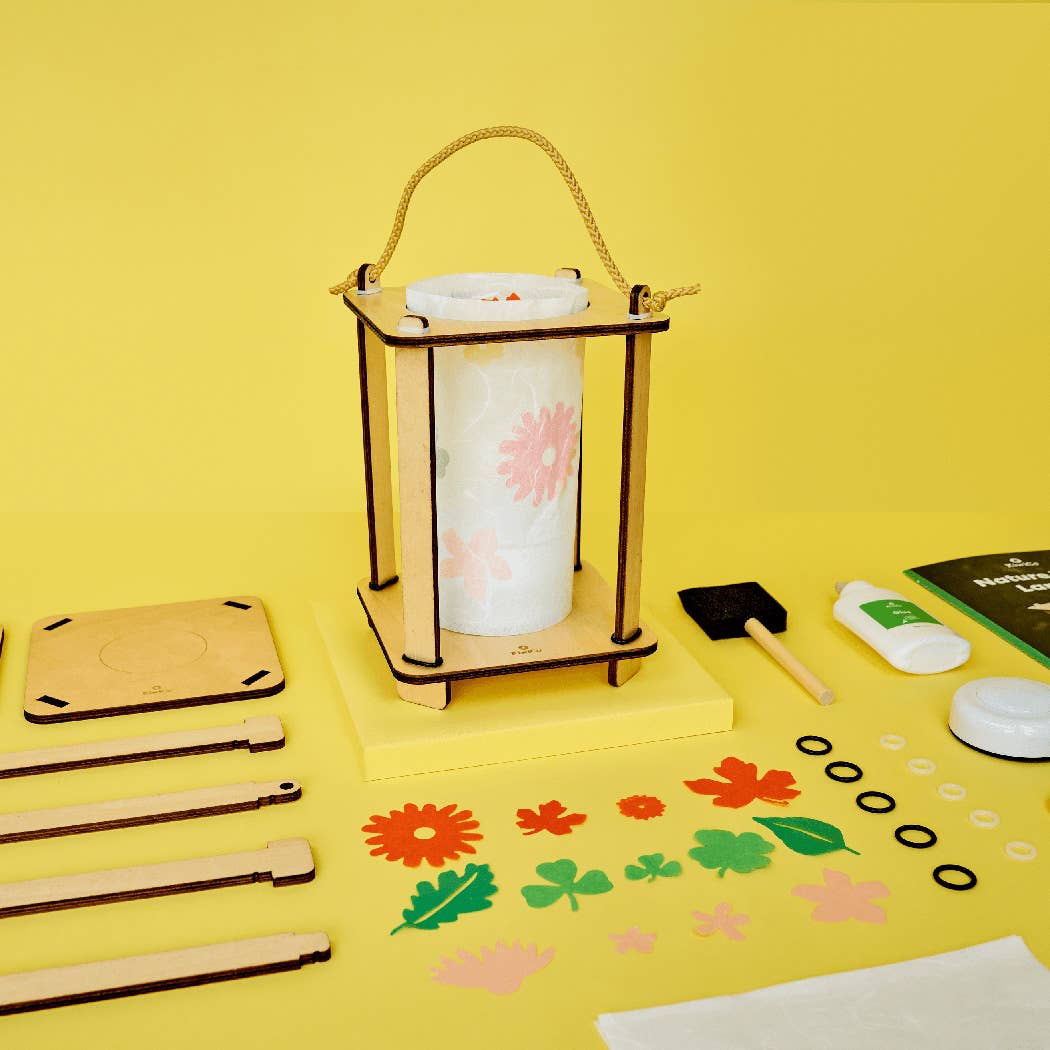 Decorative lantern with floral design on a yellow background