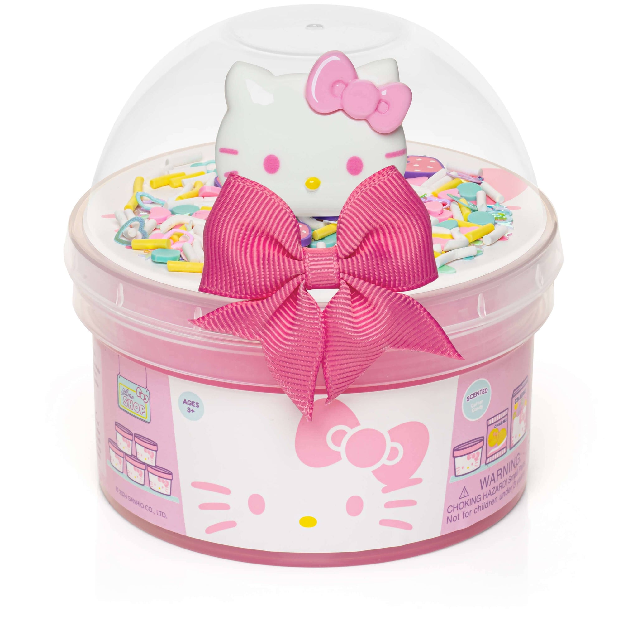 Hello Kitty toy with a pink bow inside a clear container on a white background