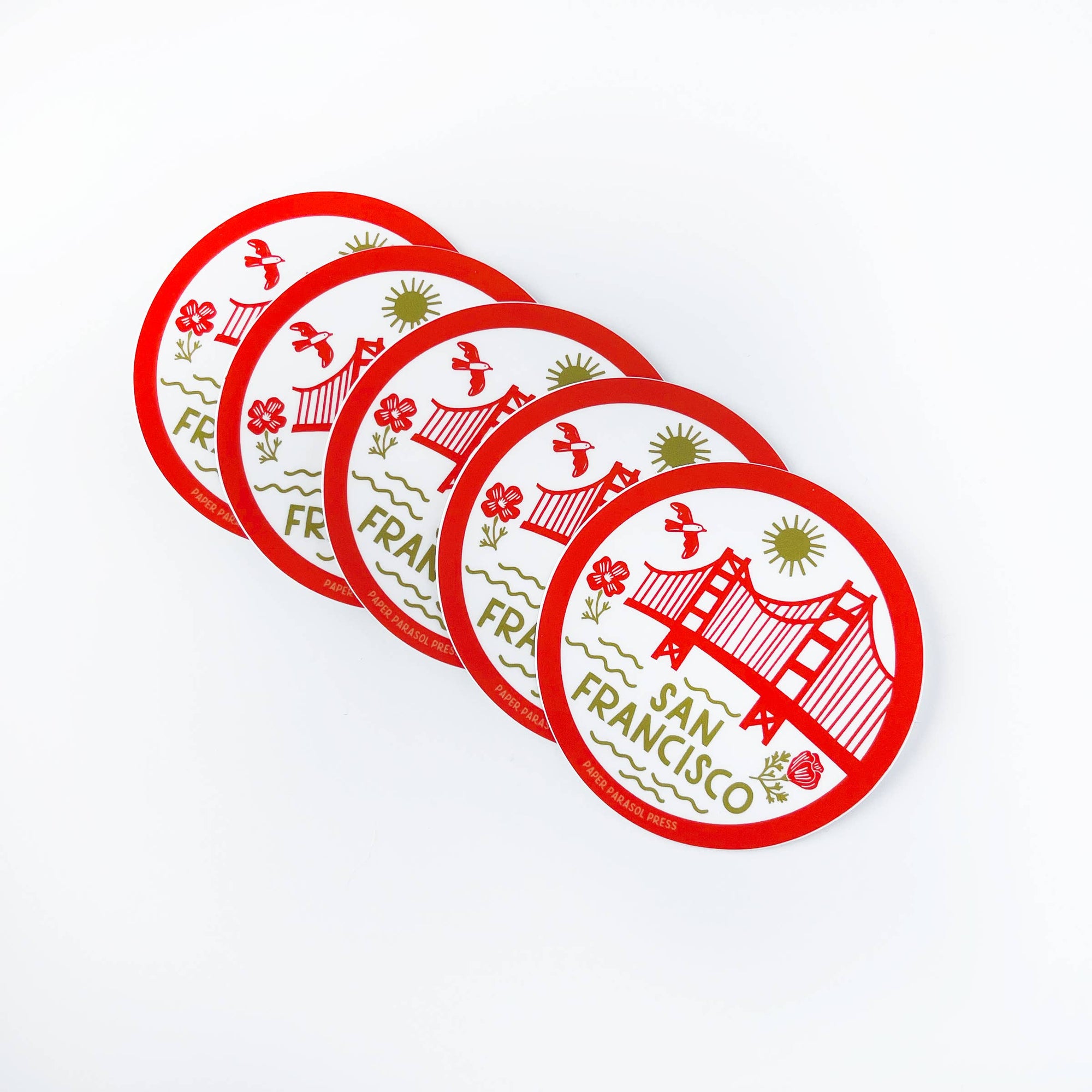 Set of red and green San Francisco-themed stickers on a white background