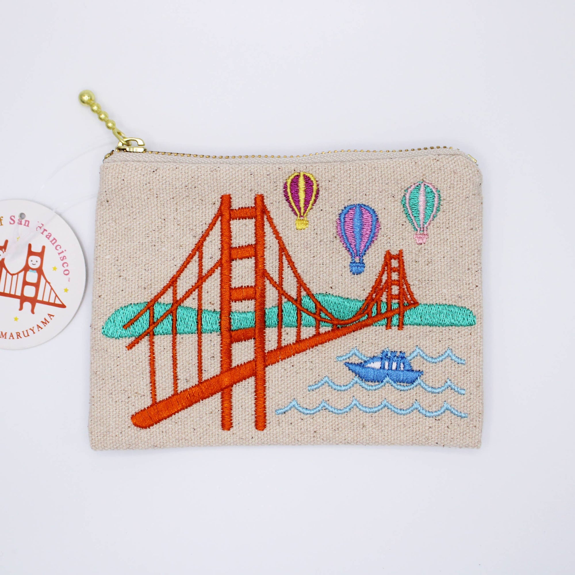 Embroidered pouch with Golden Gate Bridge design on a white background
