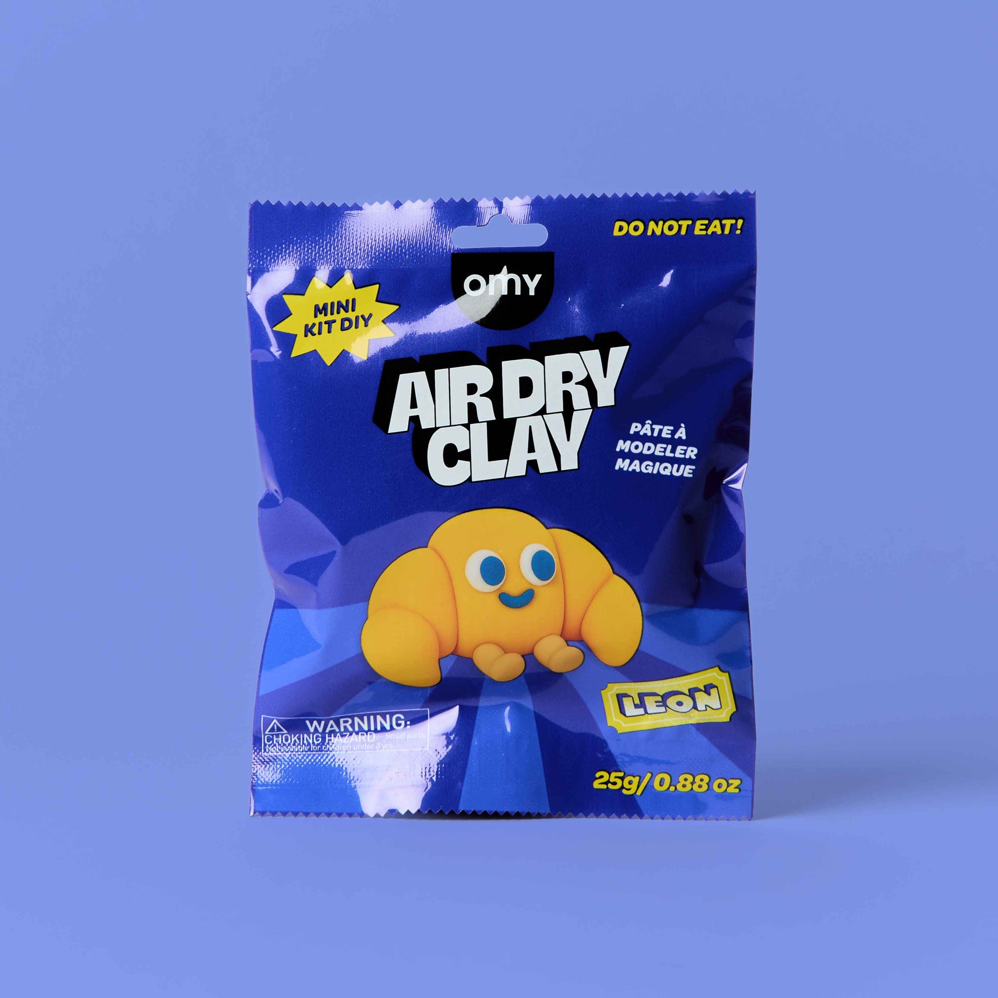 Air dry clay packaging with a blue background