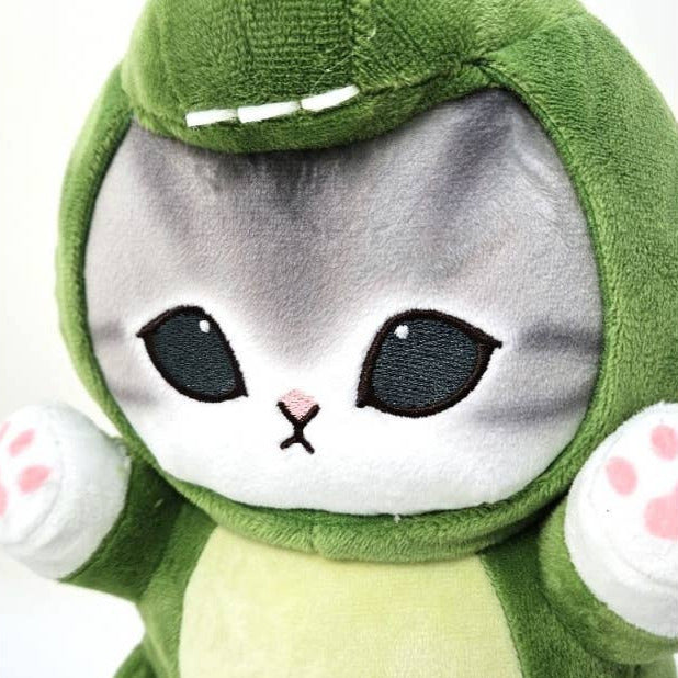 Plush toy with a green shell and gray face on a white background