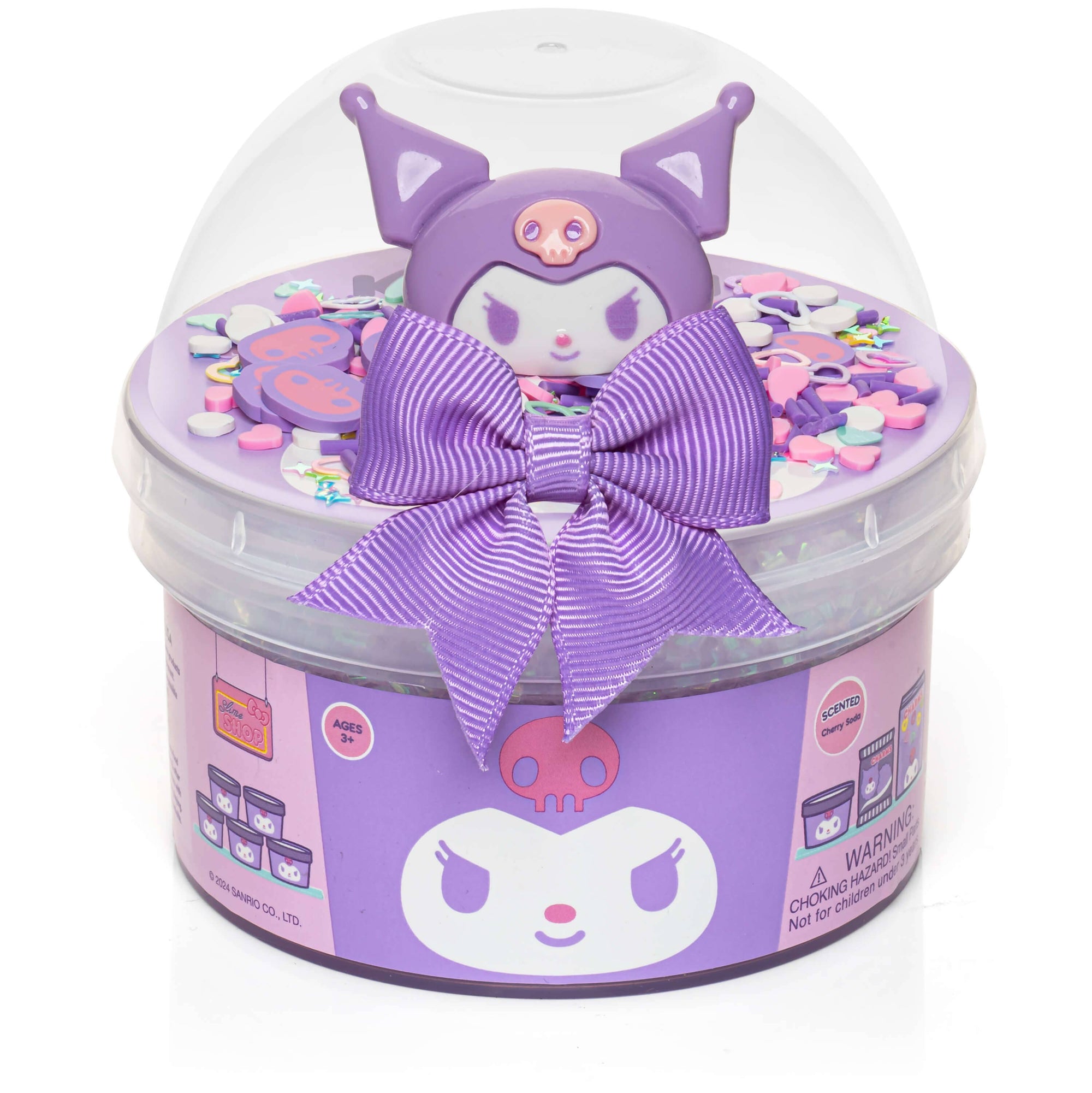 Kawaii-style toy in a clear dome with a purple bow on a white background