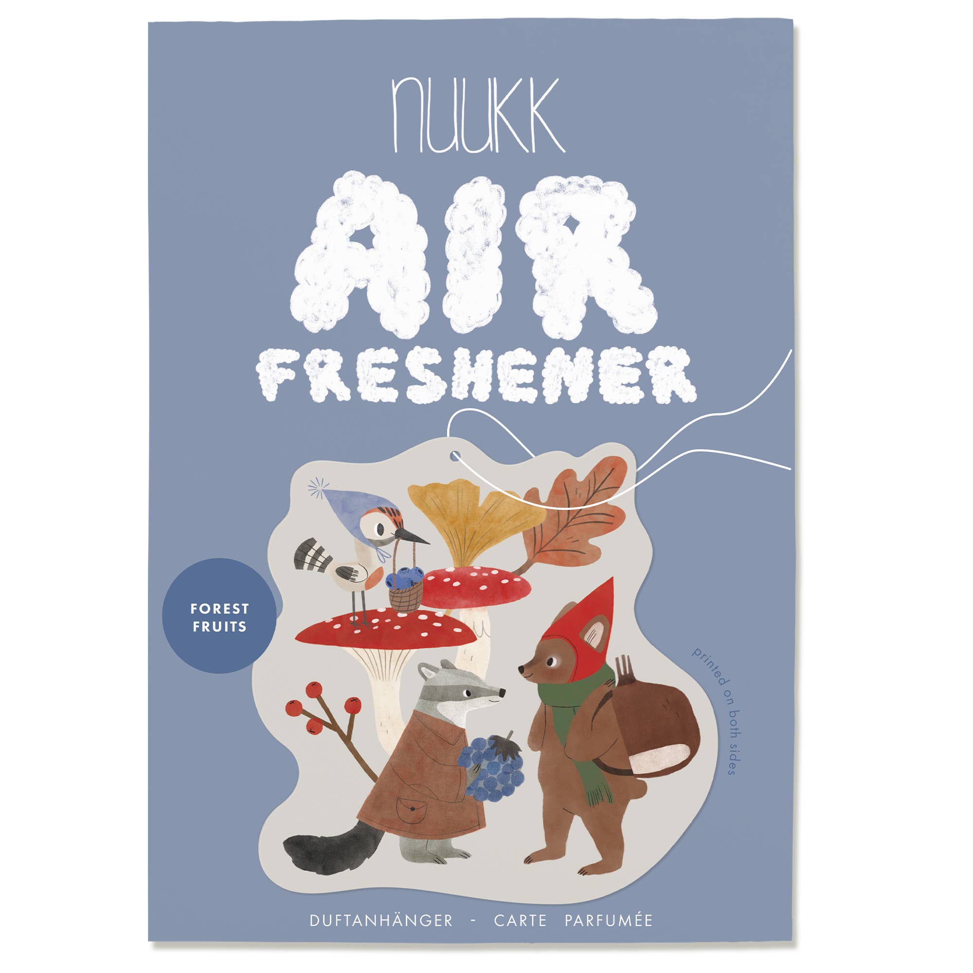Nukk air freshener packaging with forest-themed illustration on a blue background