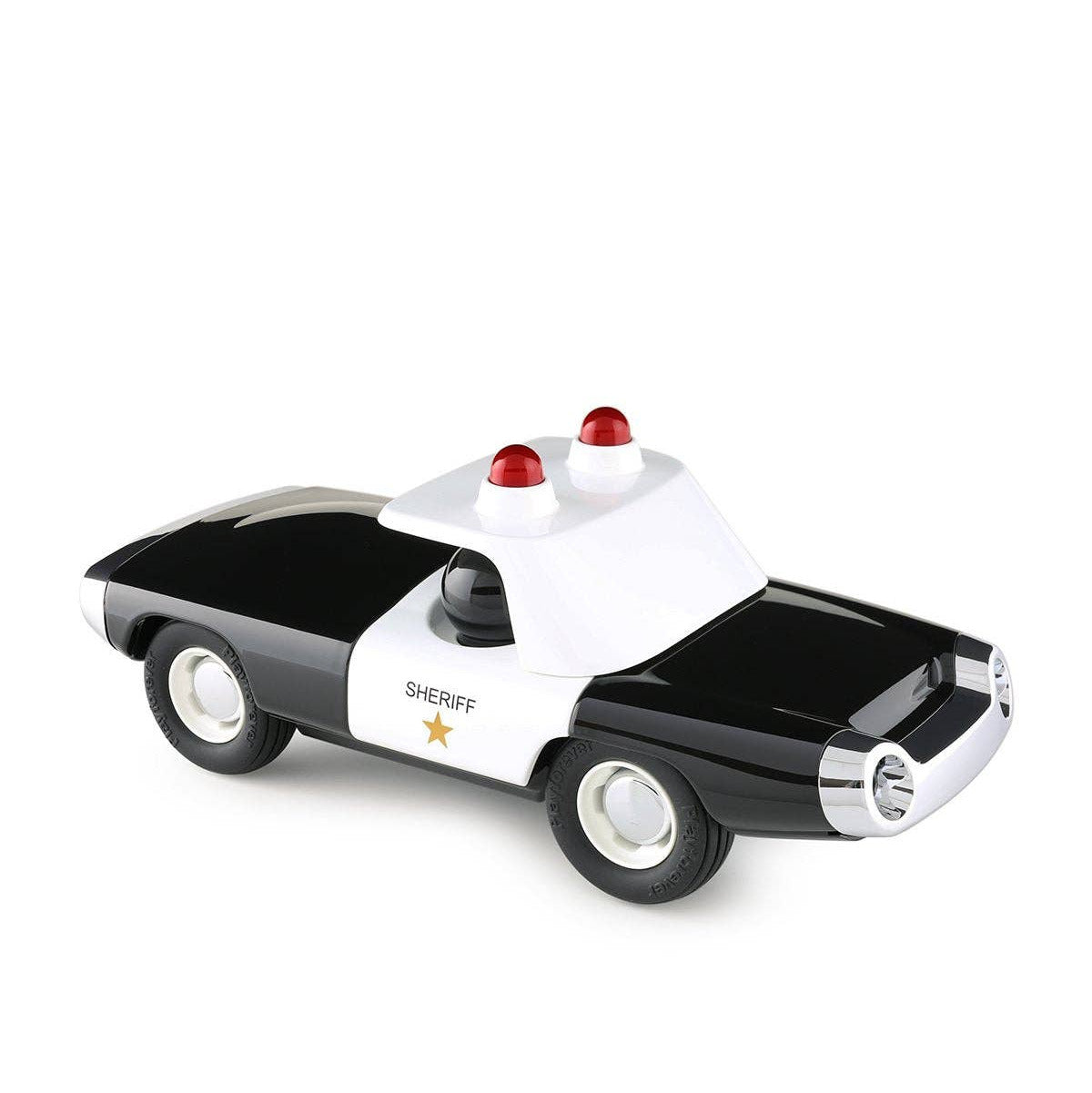 Toy sheriff car with black and white design on a white background