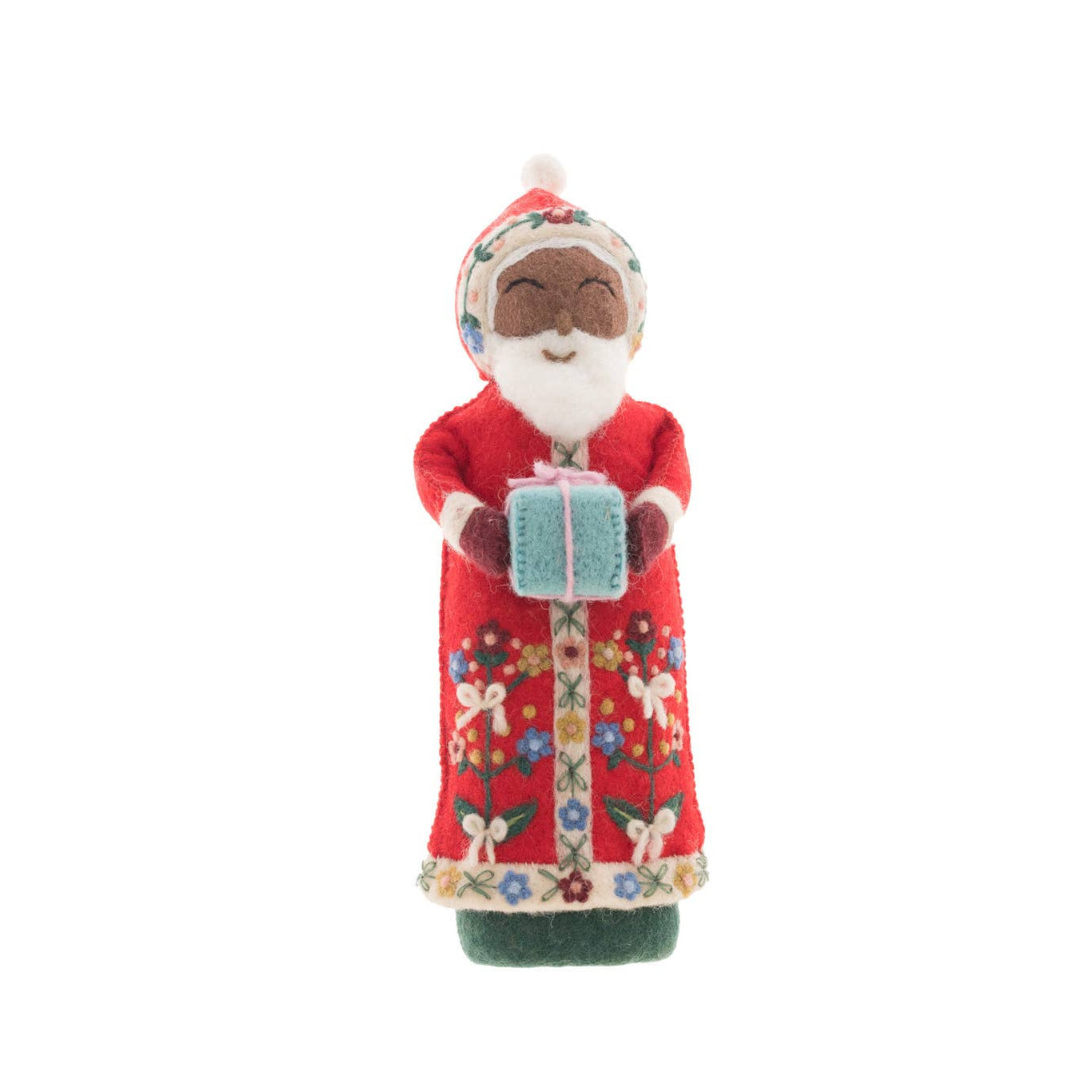 Decorative figure of a person in a red outfit with a gift on a white background