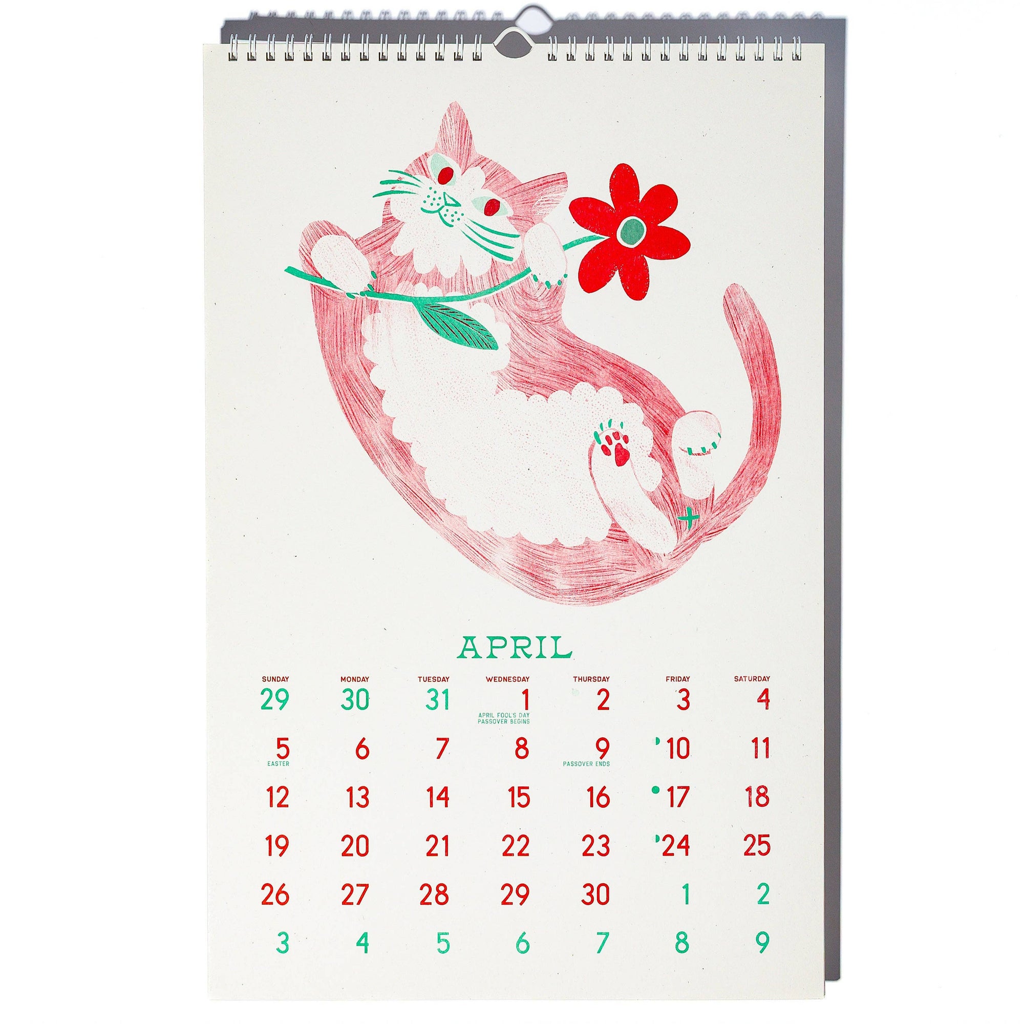 Calendar with a pink cat illustration and flower on a white background