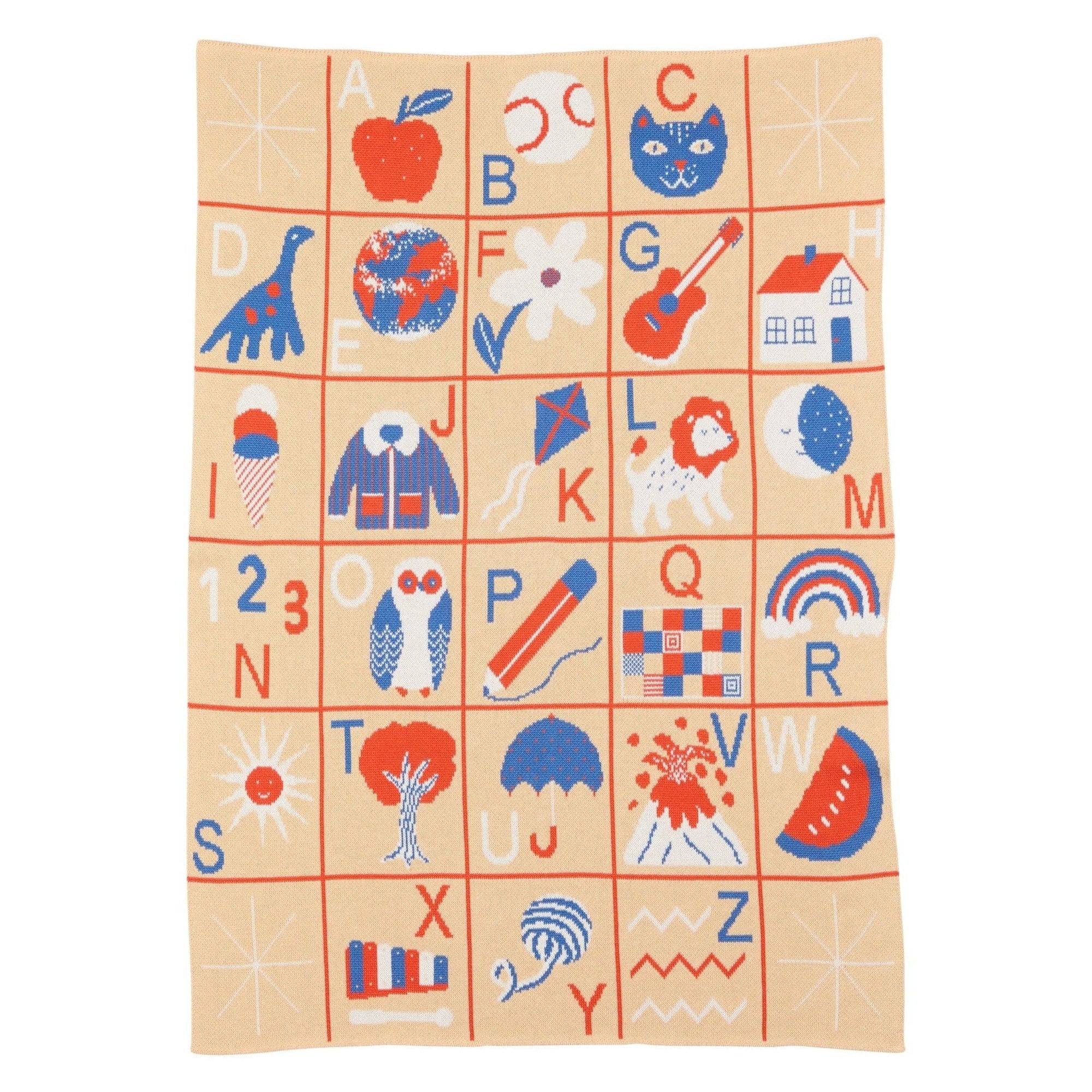 Children's alphabet blanket with colorful letters and illustrations on a beige background