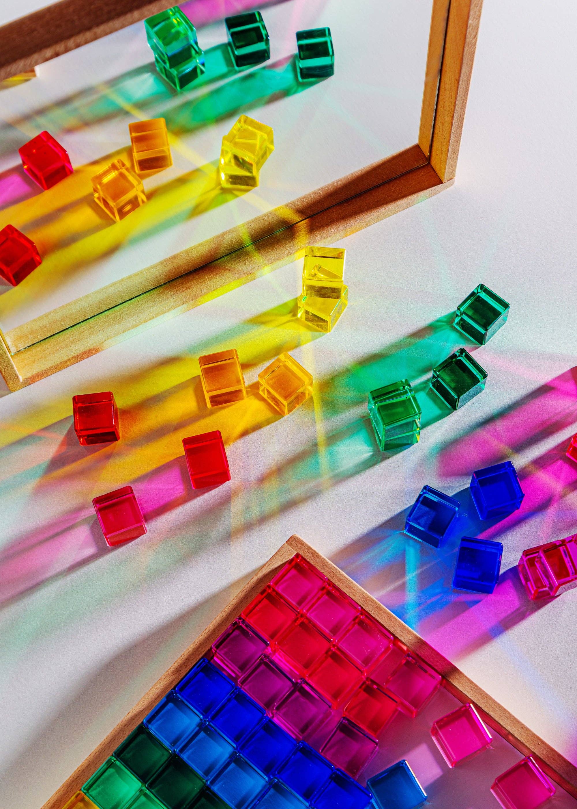 Colorful abacus with transparent beads on a white background
