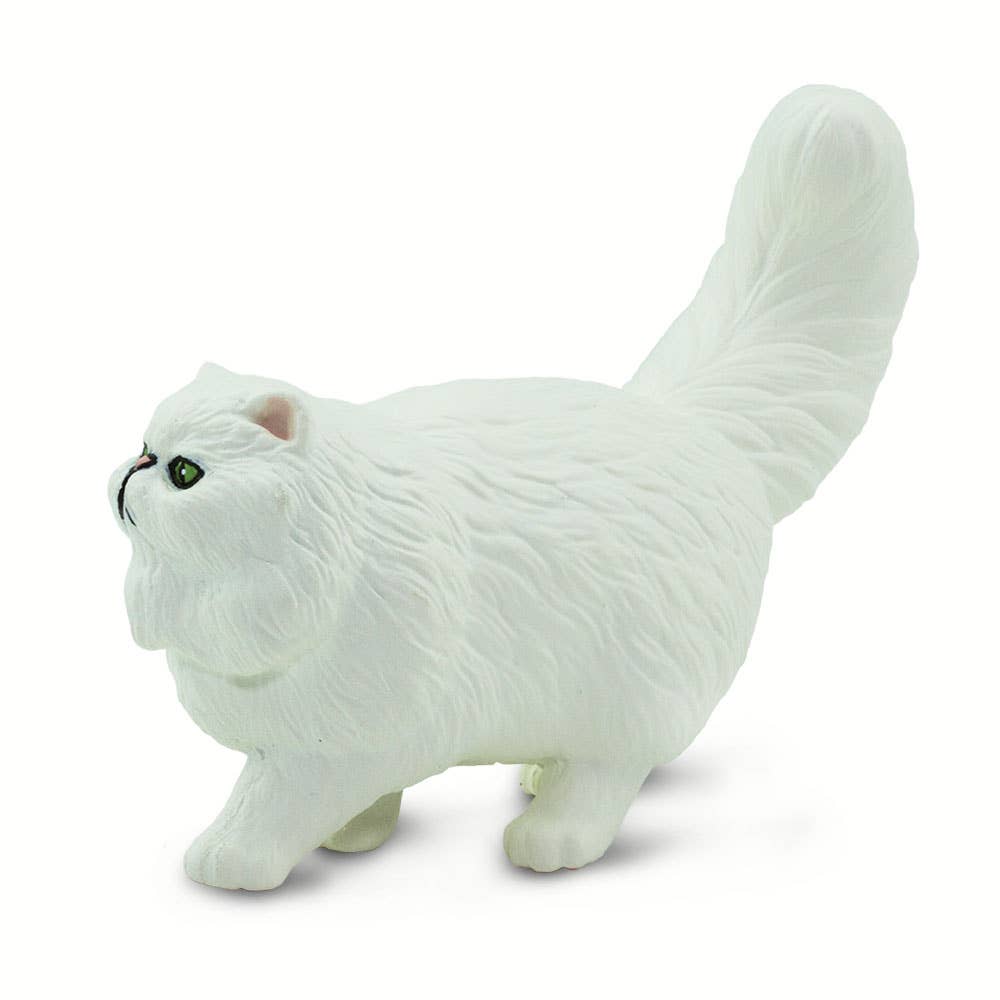 White cat figurine on a white background
