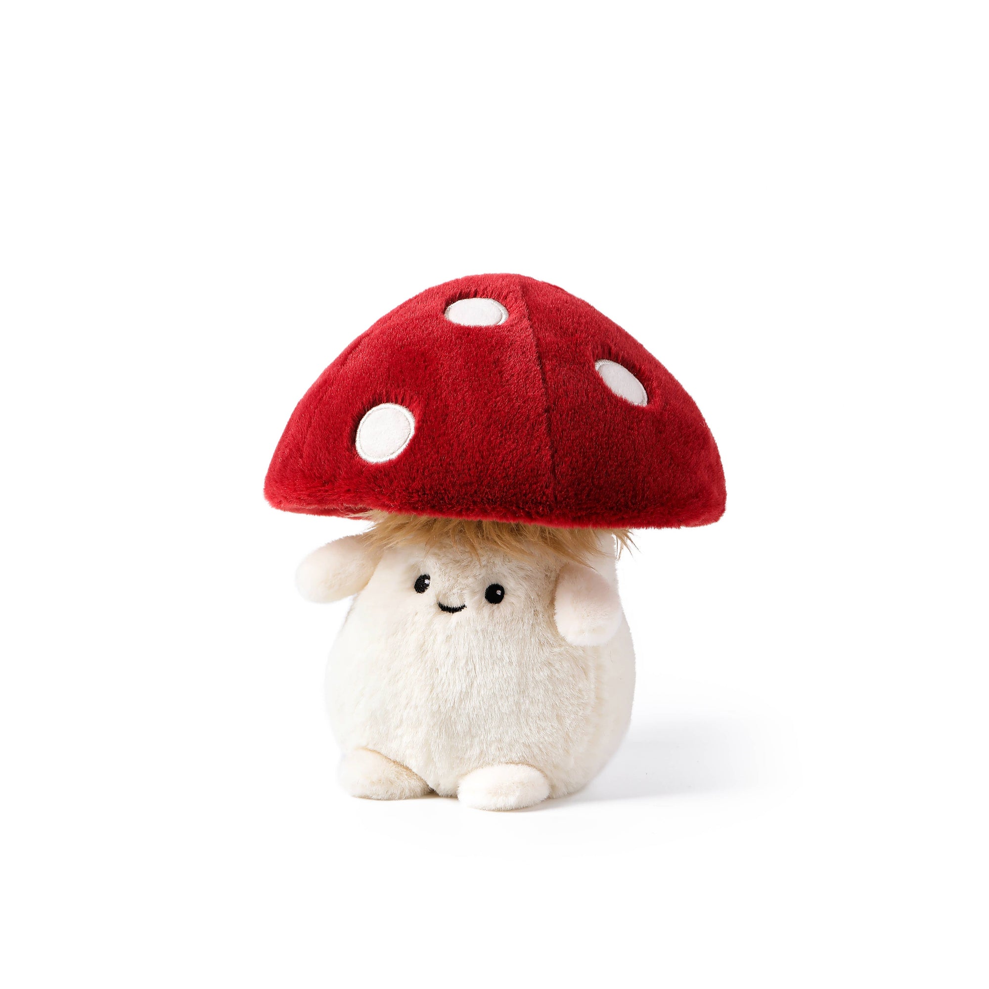 Plush toy with a red mushroom-shaped hat on a white background