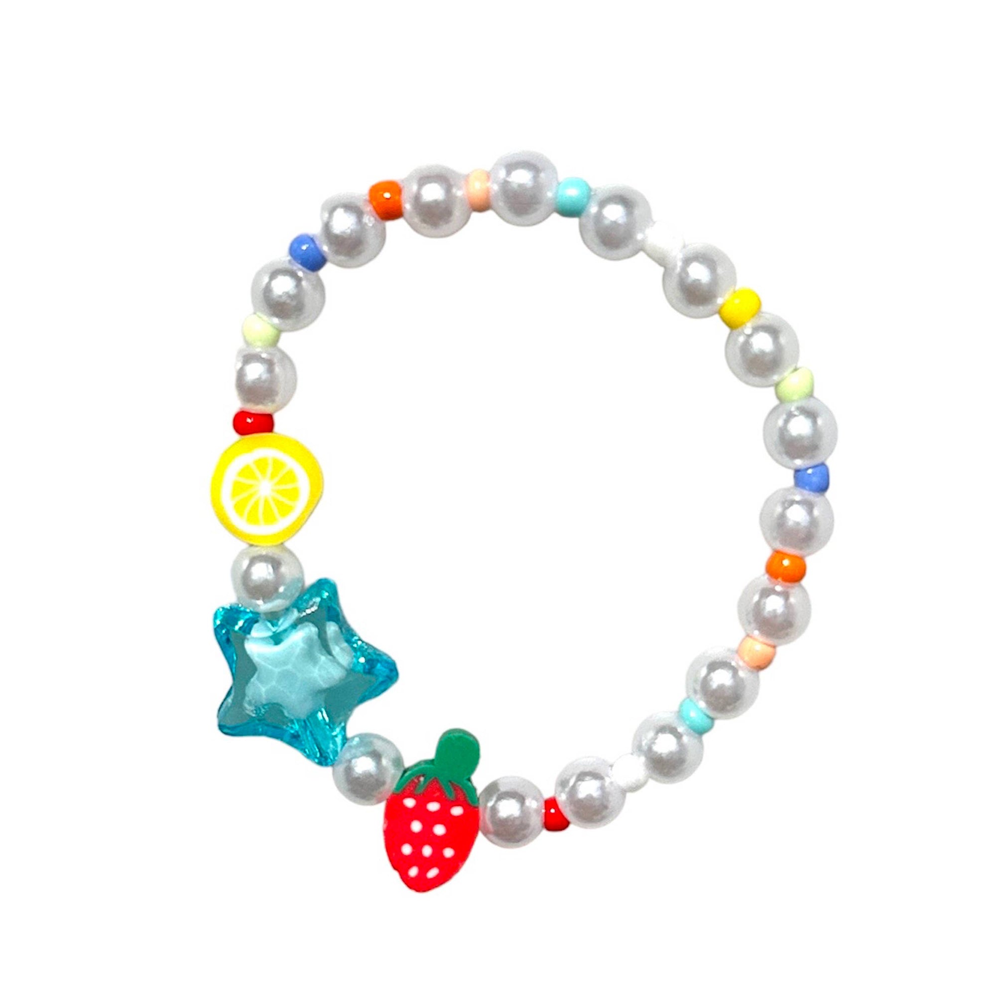 Colorful beaded bracelet with star, lemon, and strawberry charms on a white background