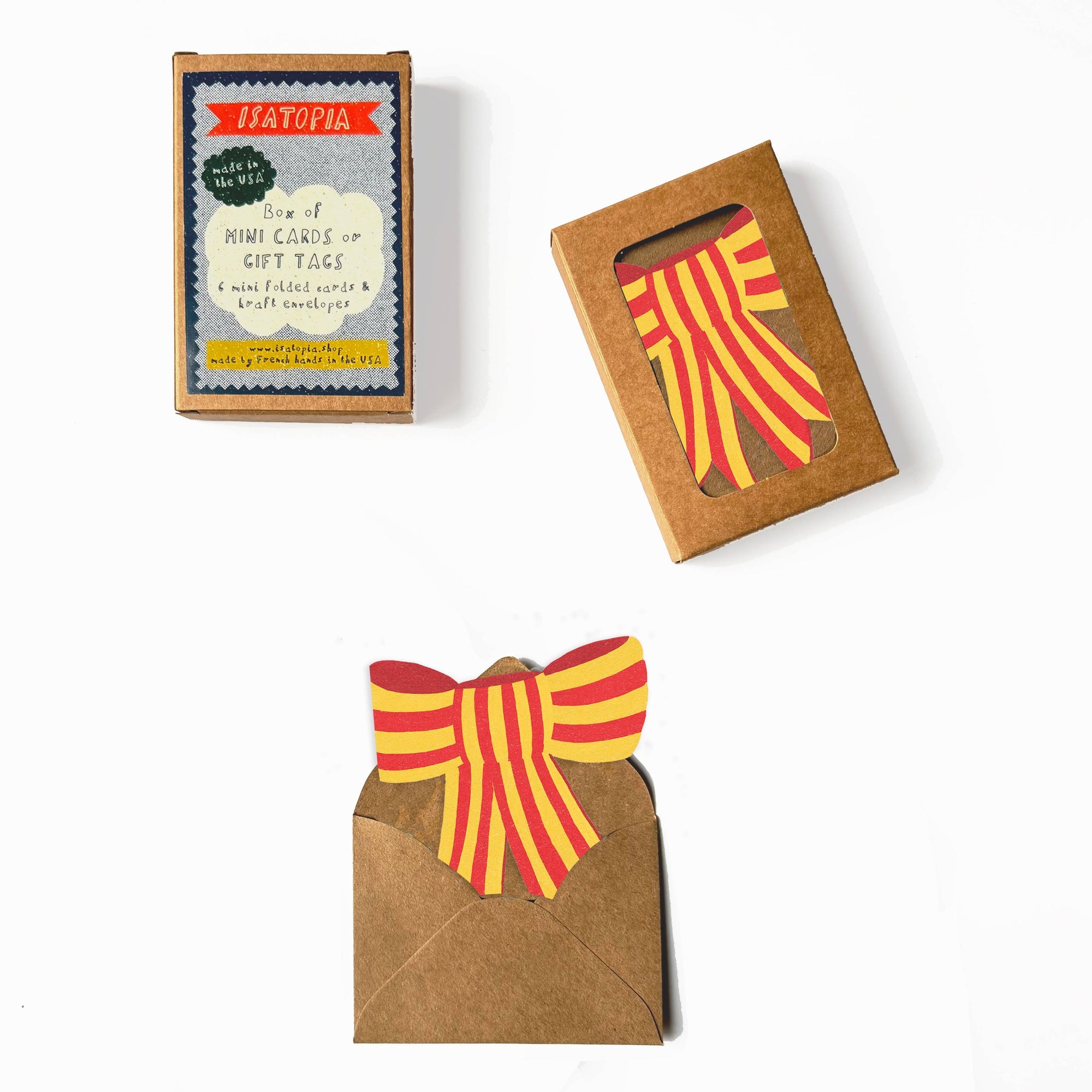 Packaged gift tags with red and yellow ribbons on a white background