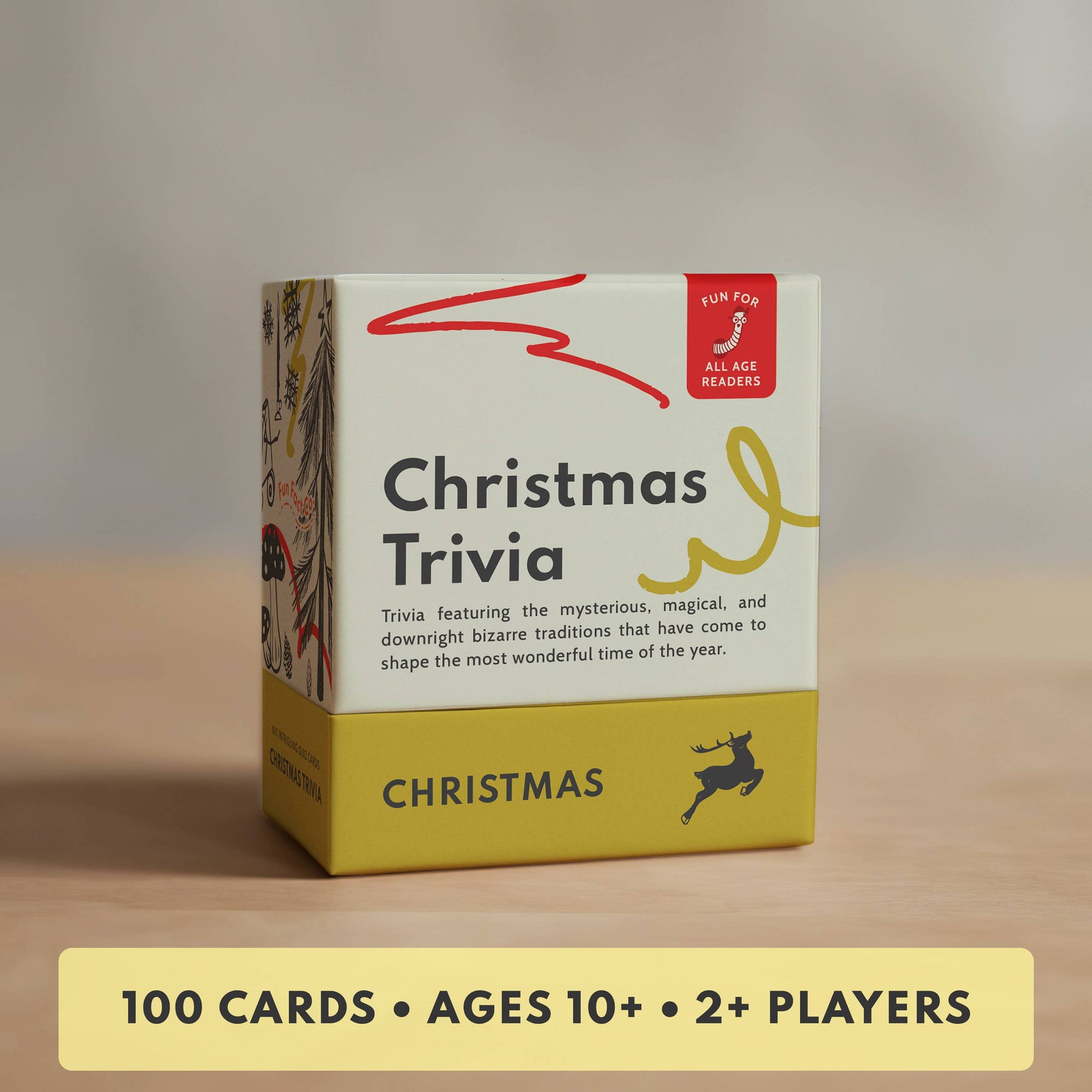 Box of Christmas Trivia game on a wooden surface with a neutral background