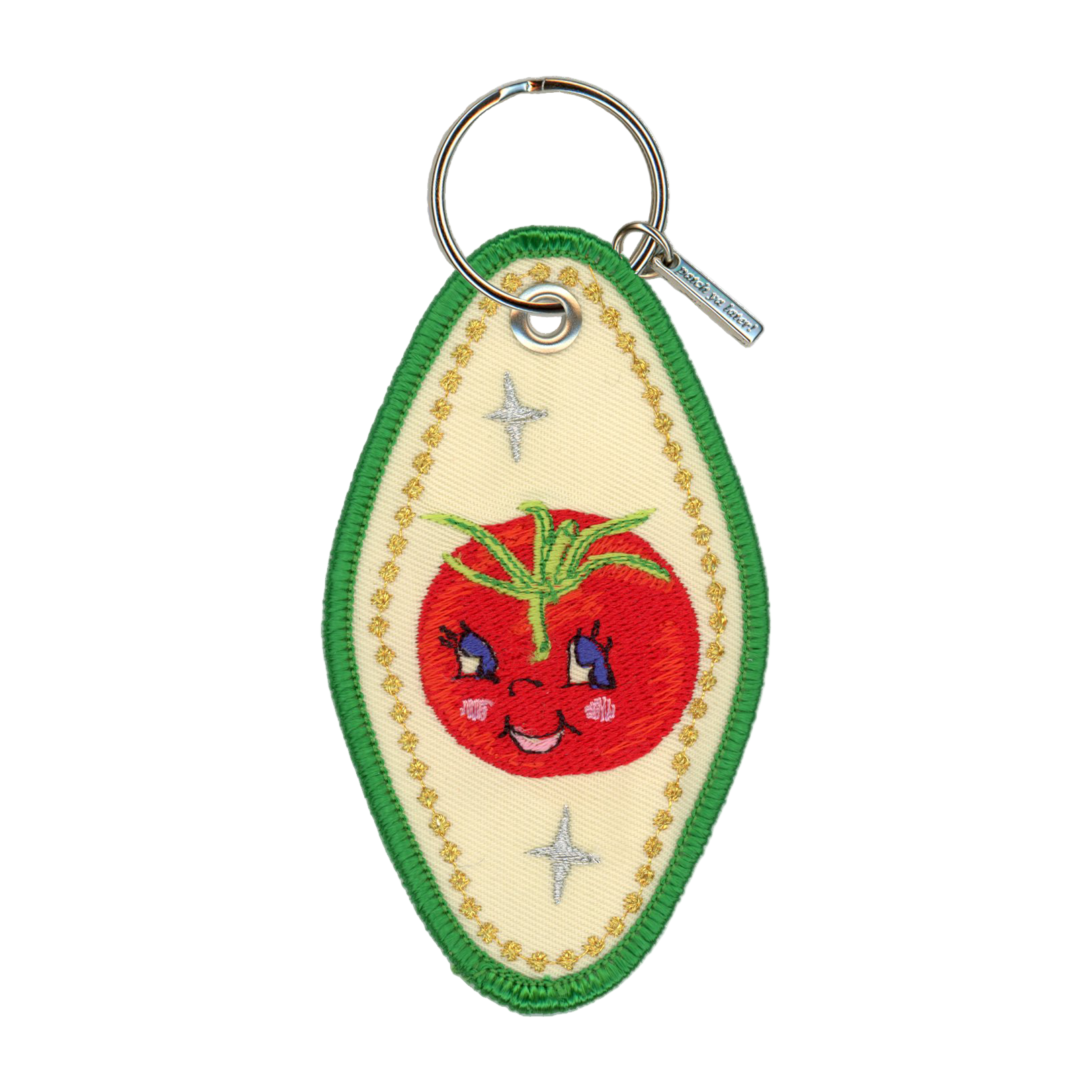 Keychain with a smiling tomato design on a white background