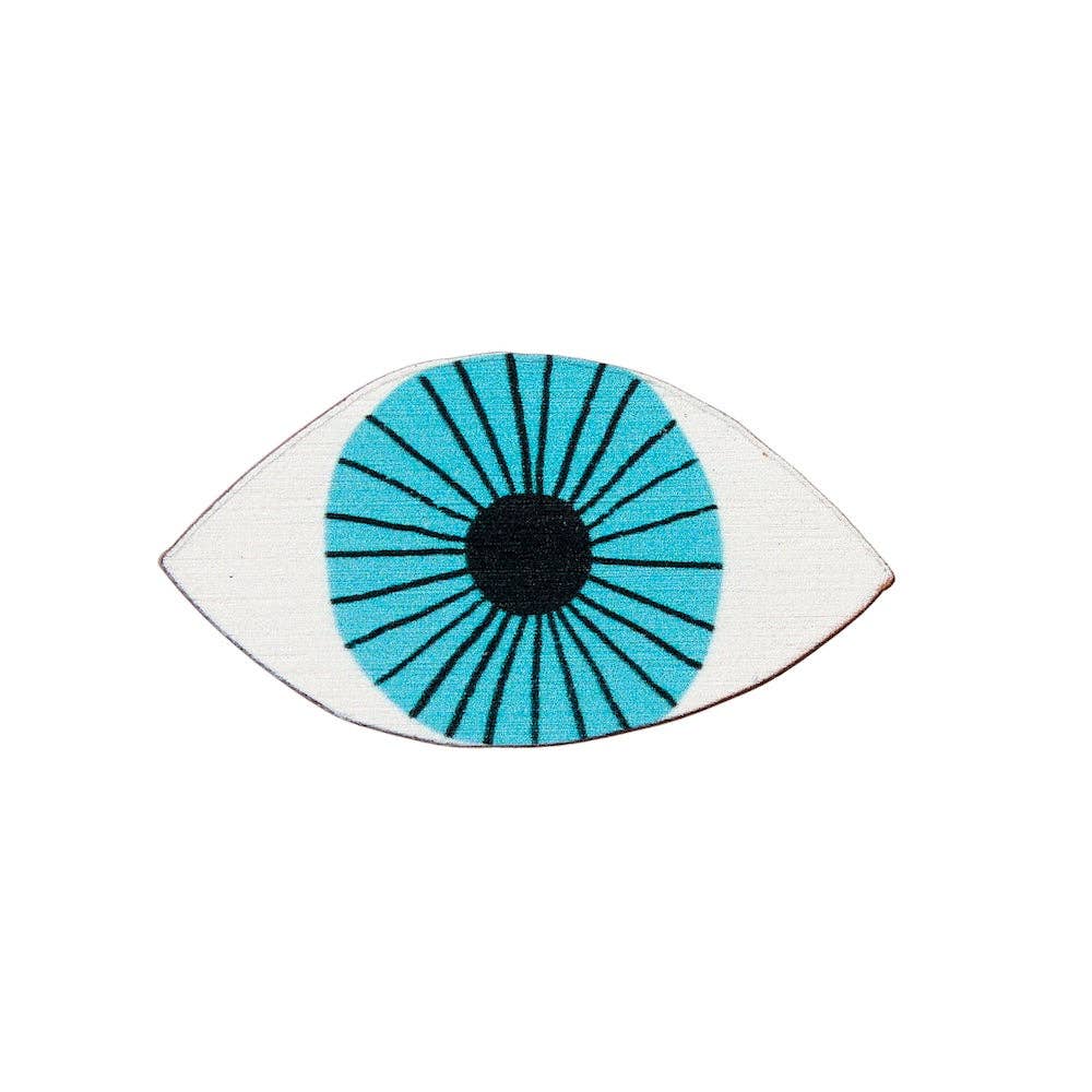 Patch of an eye with a blue and black design on a white background