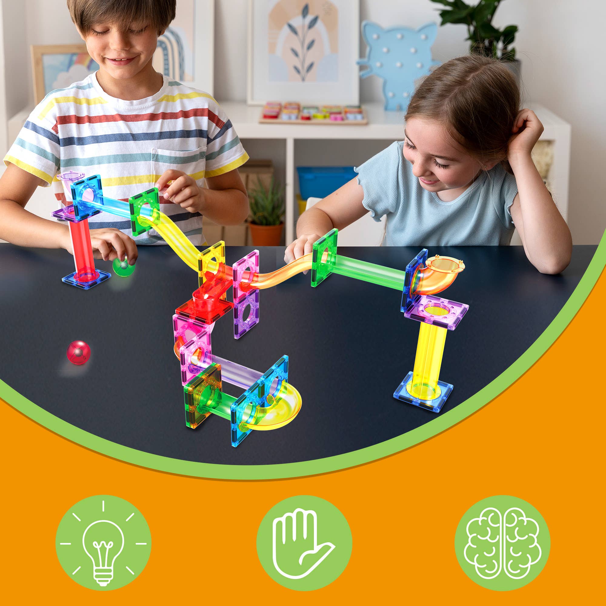 Two children playing with a colorful marble run toy set on a table.