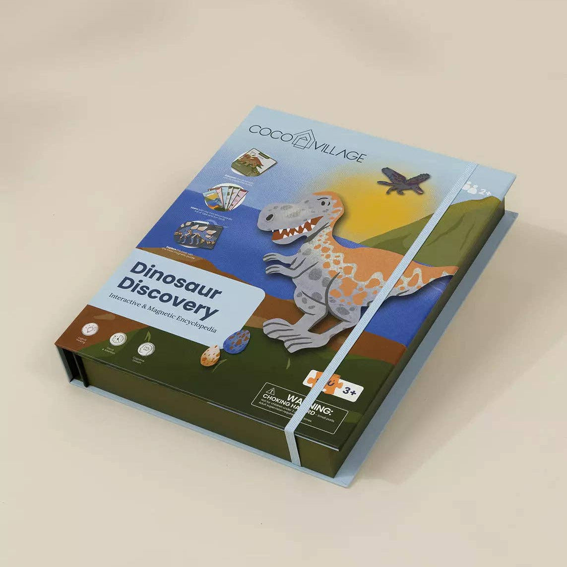 Dinosaur-themed educational kit packaging on a beige background