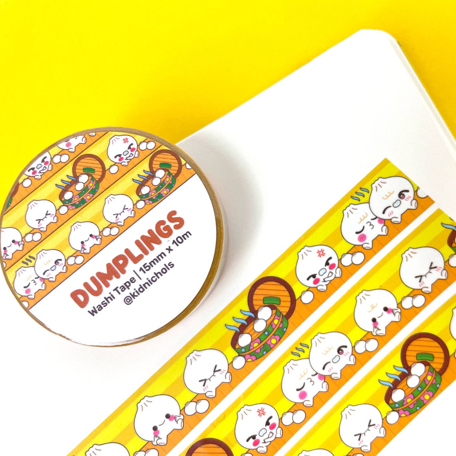 Washi tape with dumpling design on a yellow background
