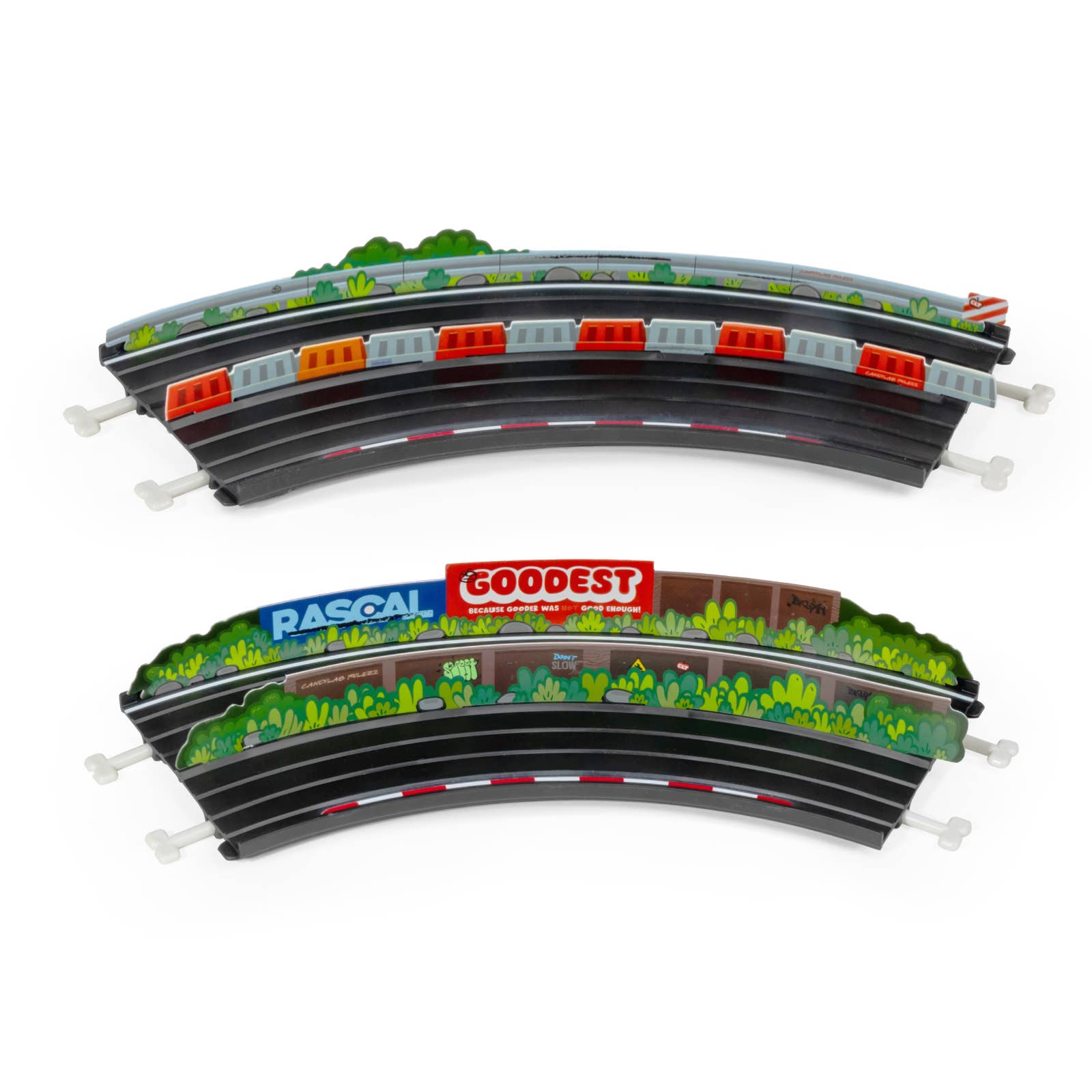 Toy train tracks with scenic elements on a white background
