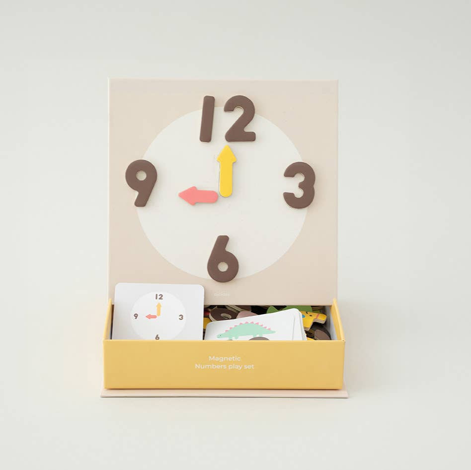 Clock-shaped product in a box on a white background